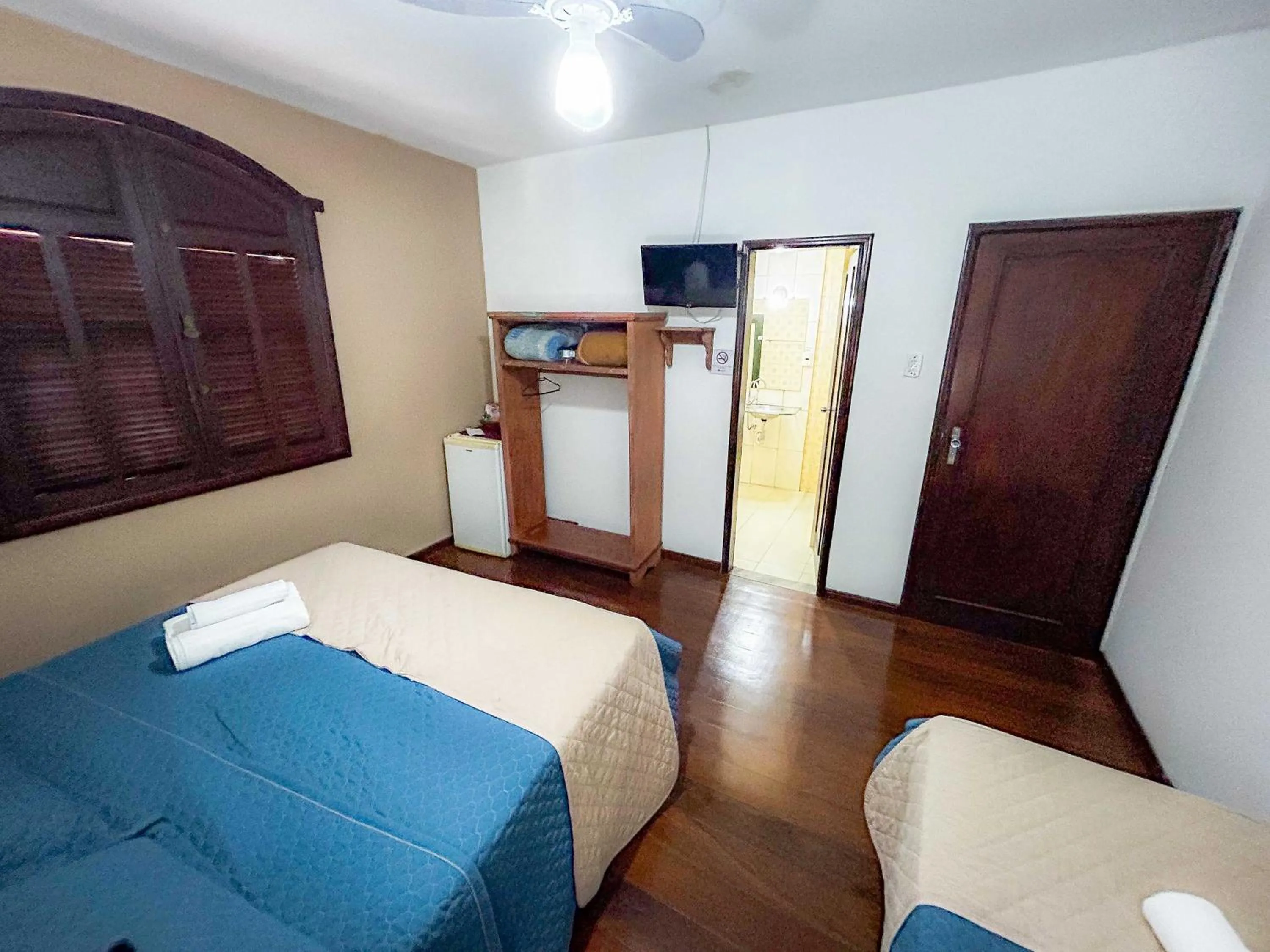 Bed in Pousada dos Sinos