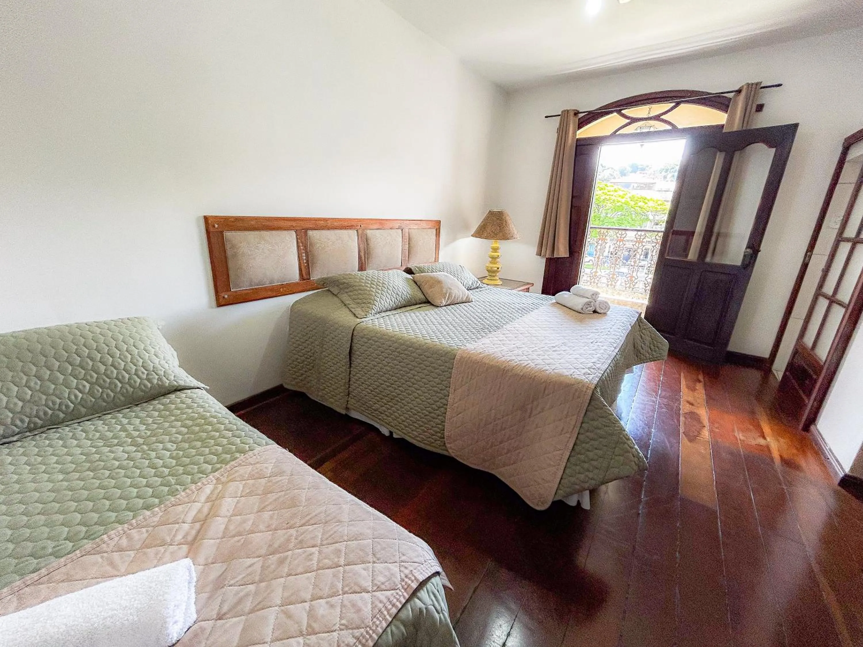 Bed in Pousada dos Sinos