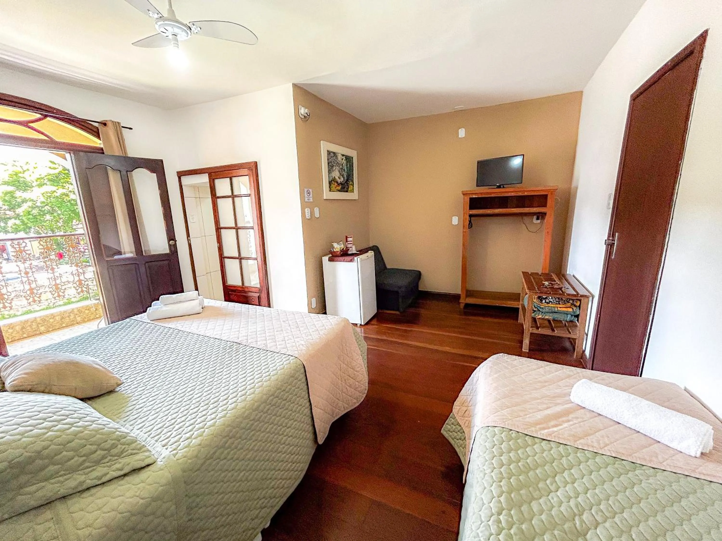 Bed in Pousada dos Sinos