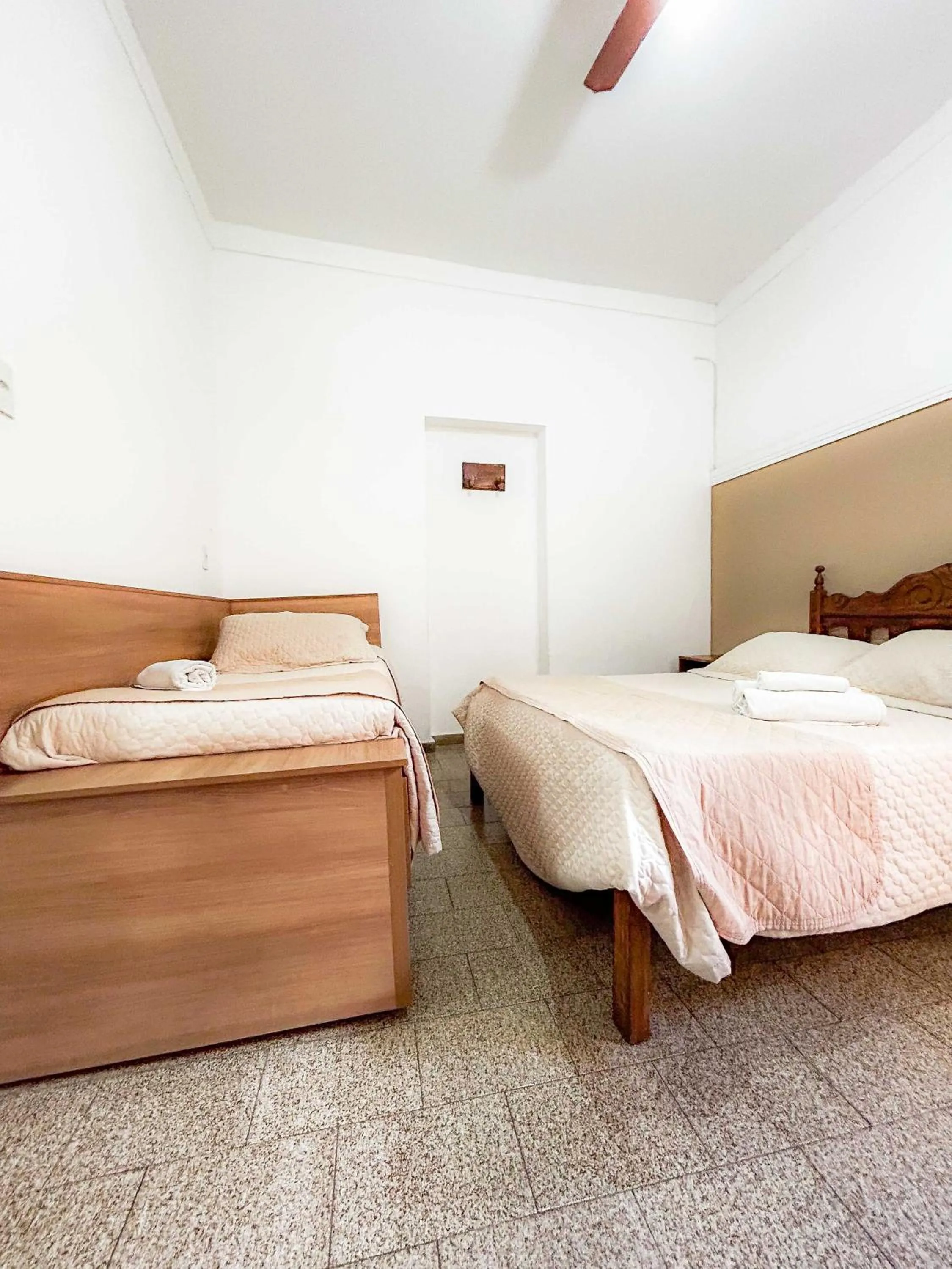 Bed in Pousada dos Sinos