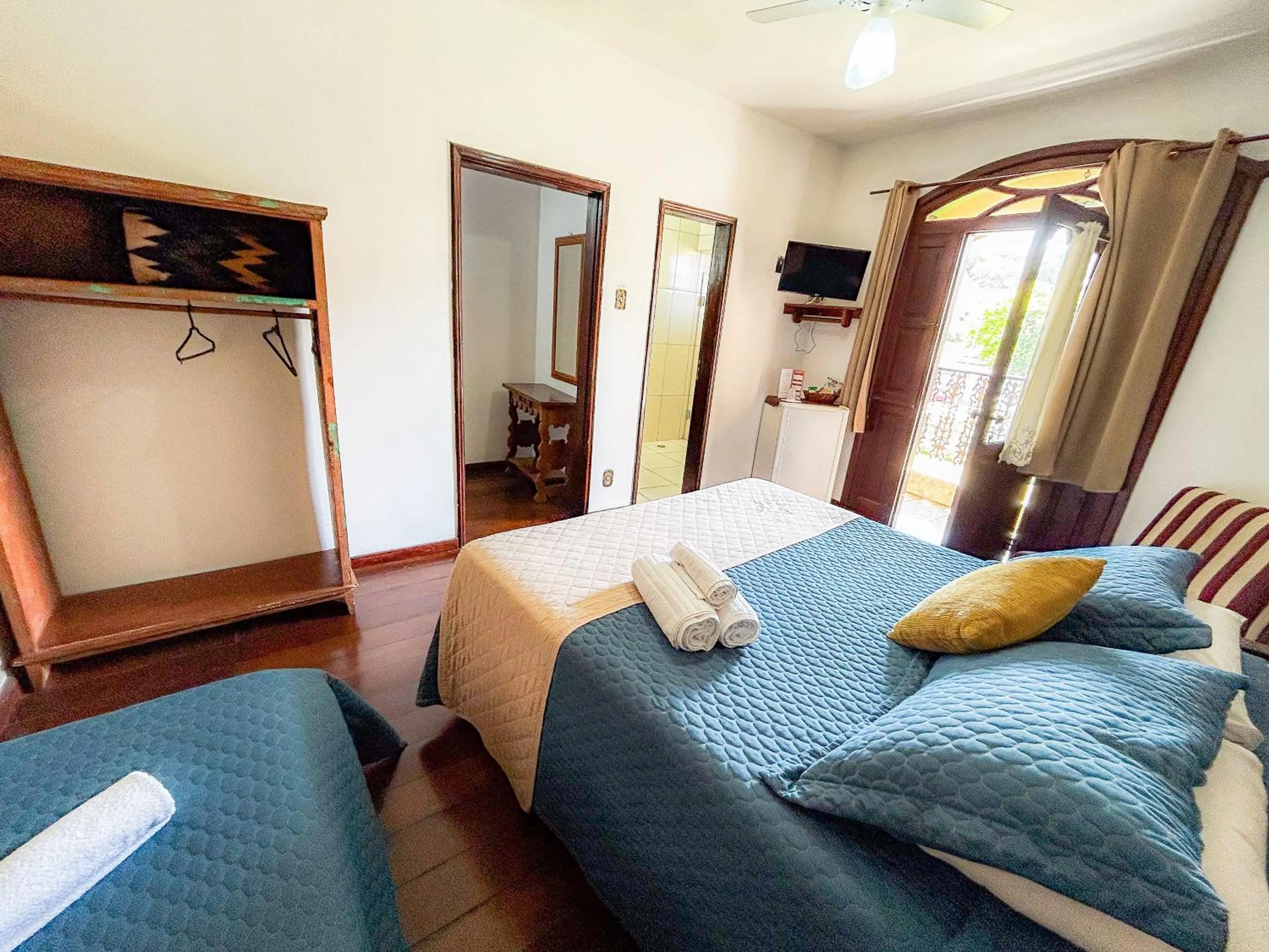 Bed in Pousada dos Sinos