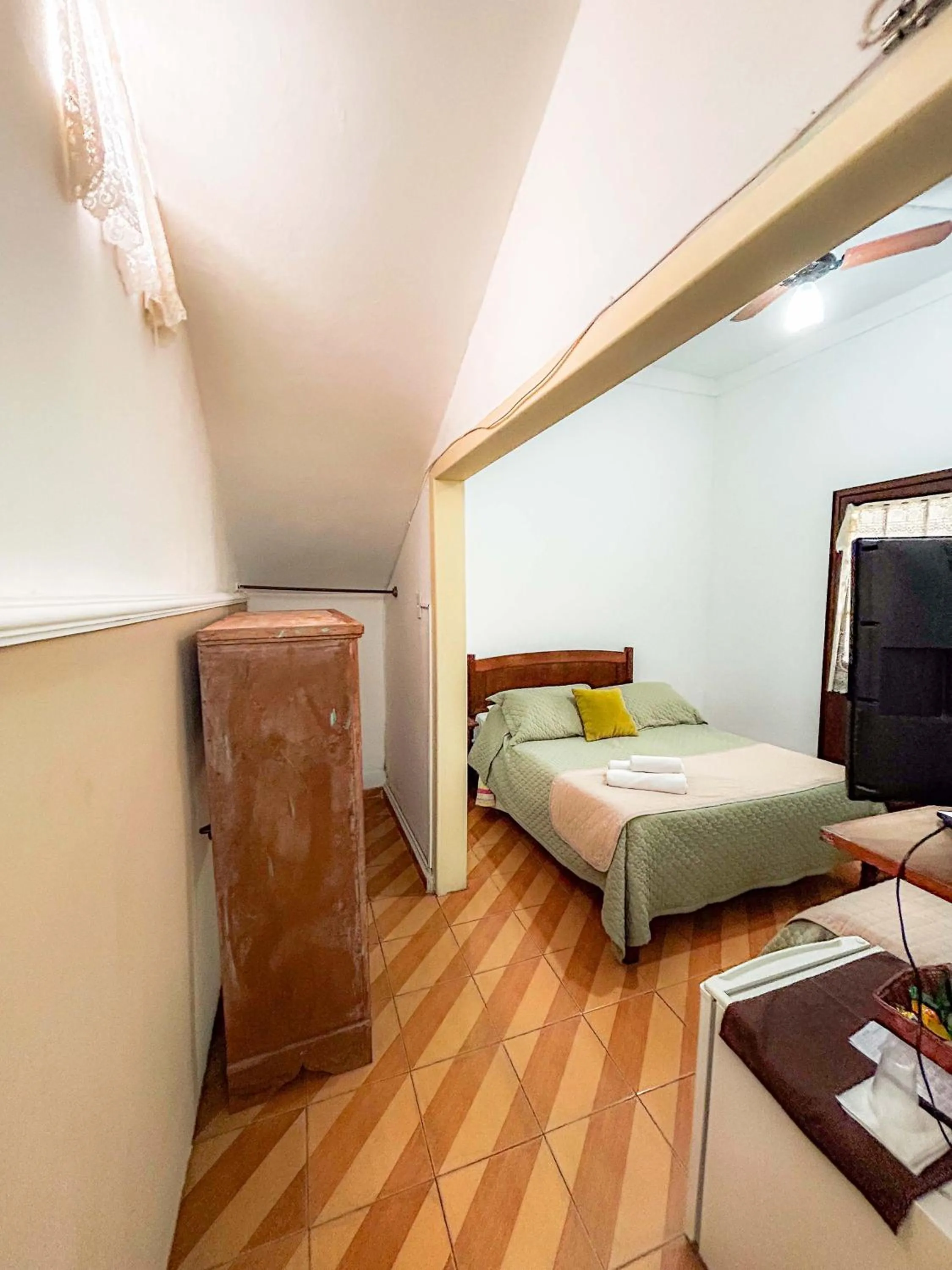 Bed in Pousada dos Sinos