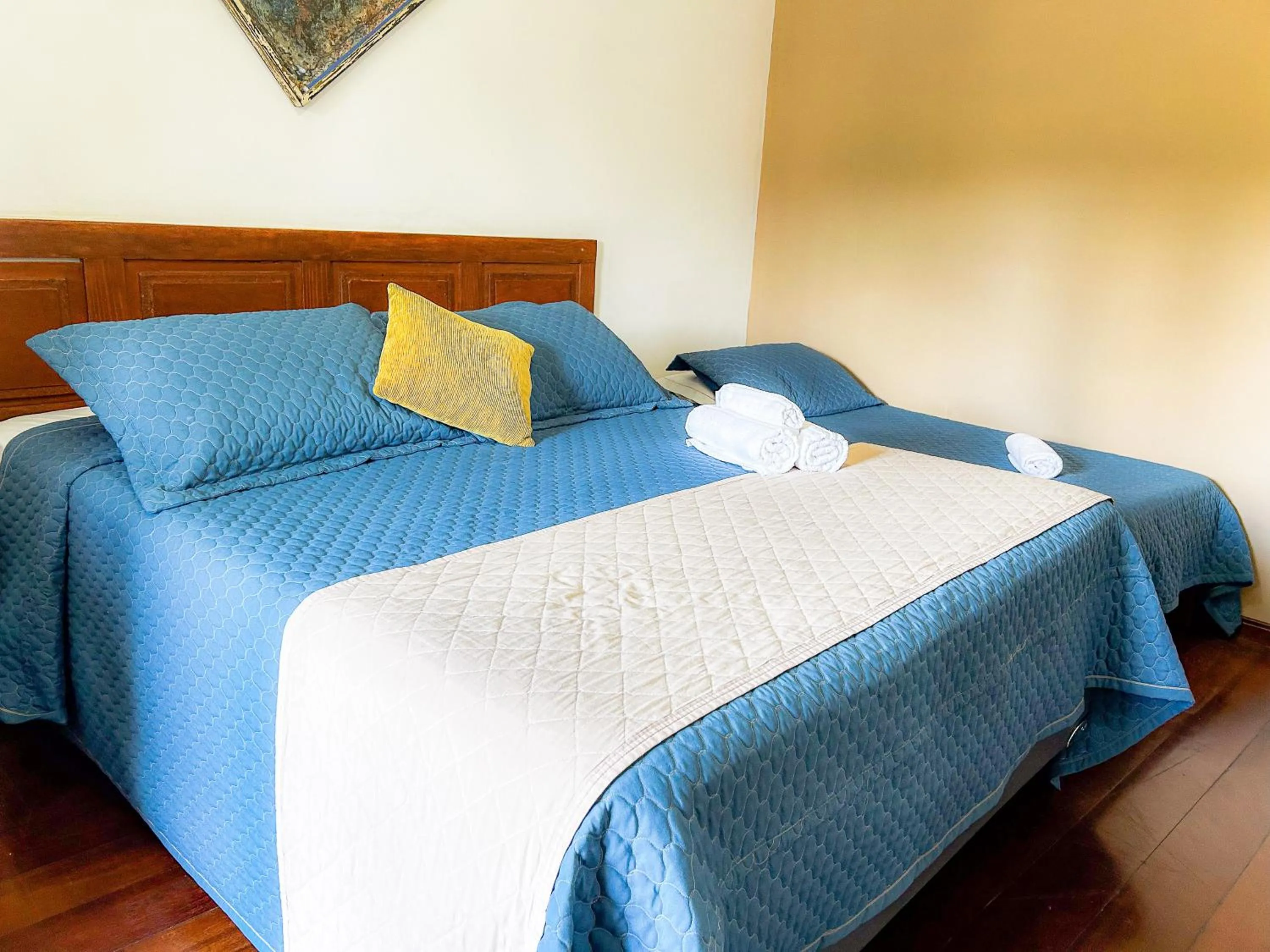 Bed in Pousada dos Sinos