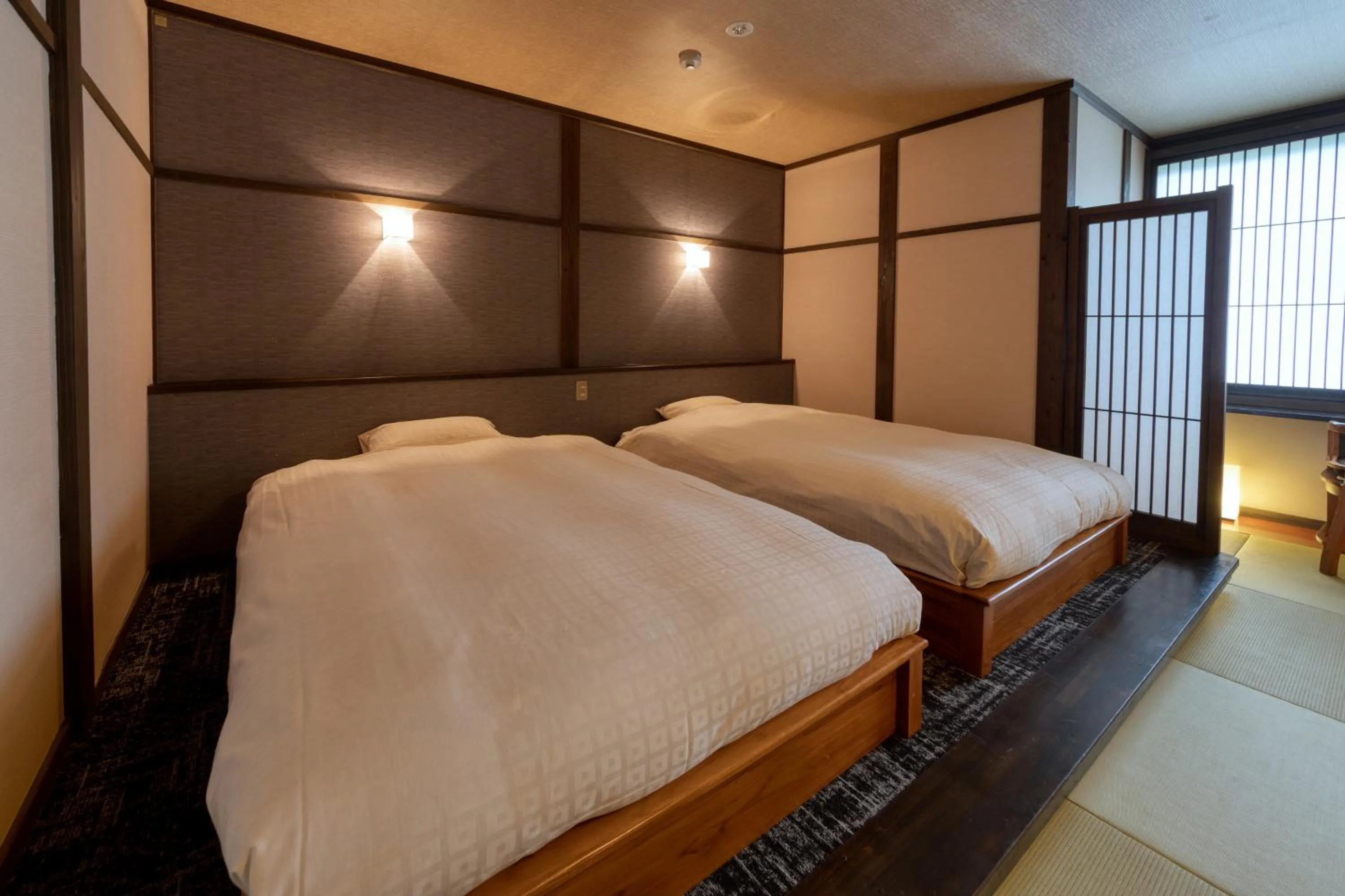 Bed in Yufuin Onsen Toshoan