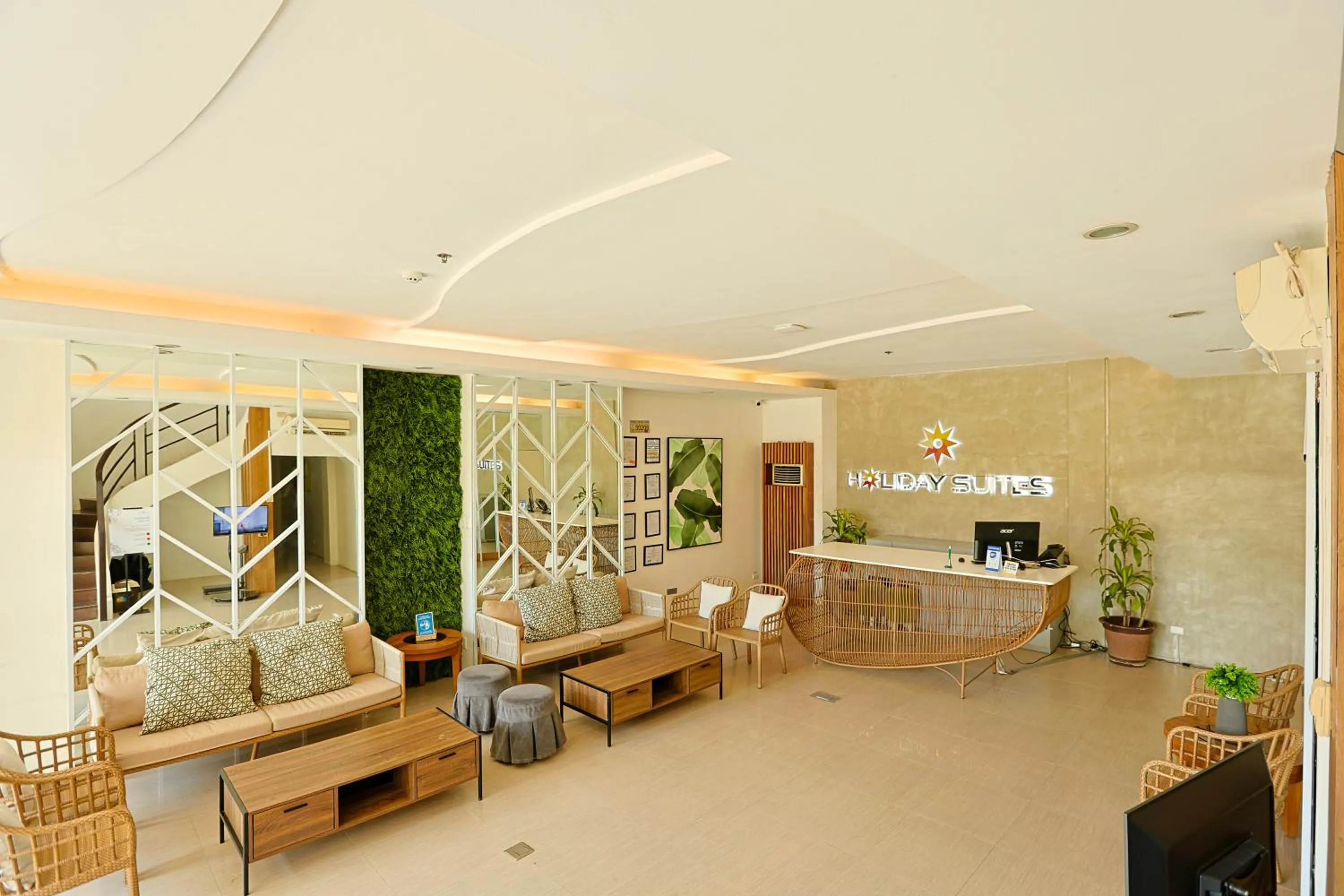 Lobby or reception in Holiday Suites Puerto Princesa