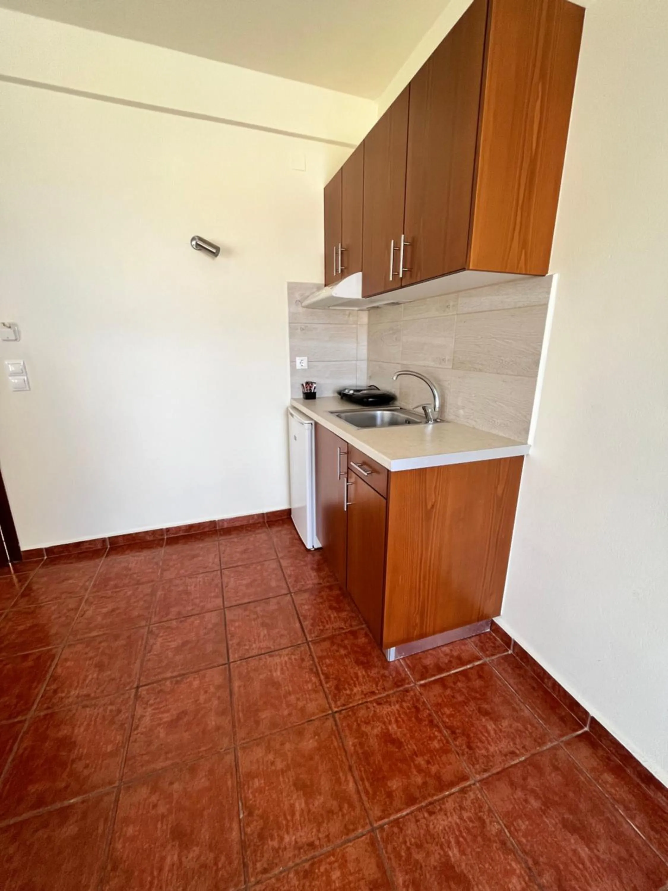 kitchen in Iolkos Hotel Apartments