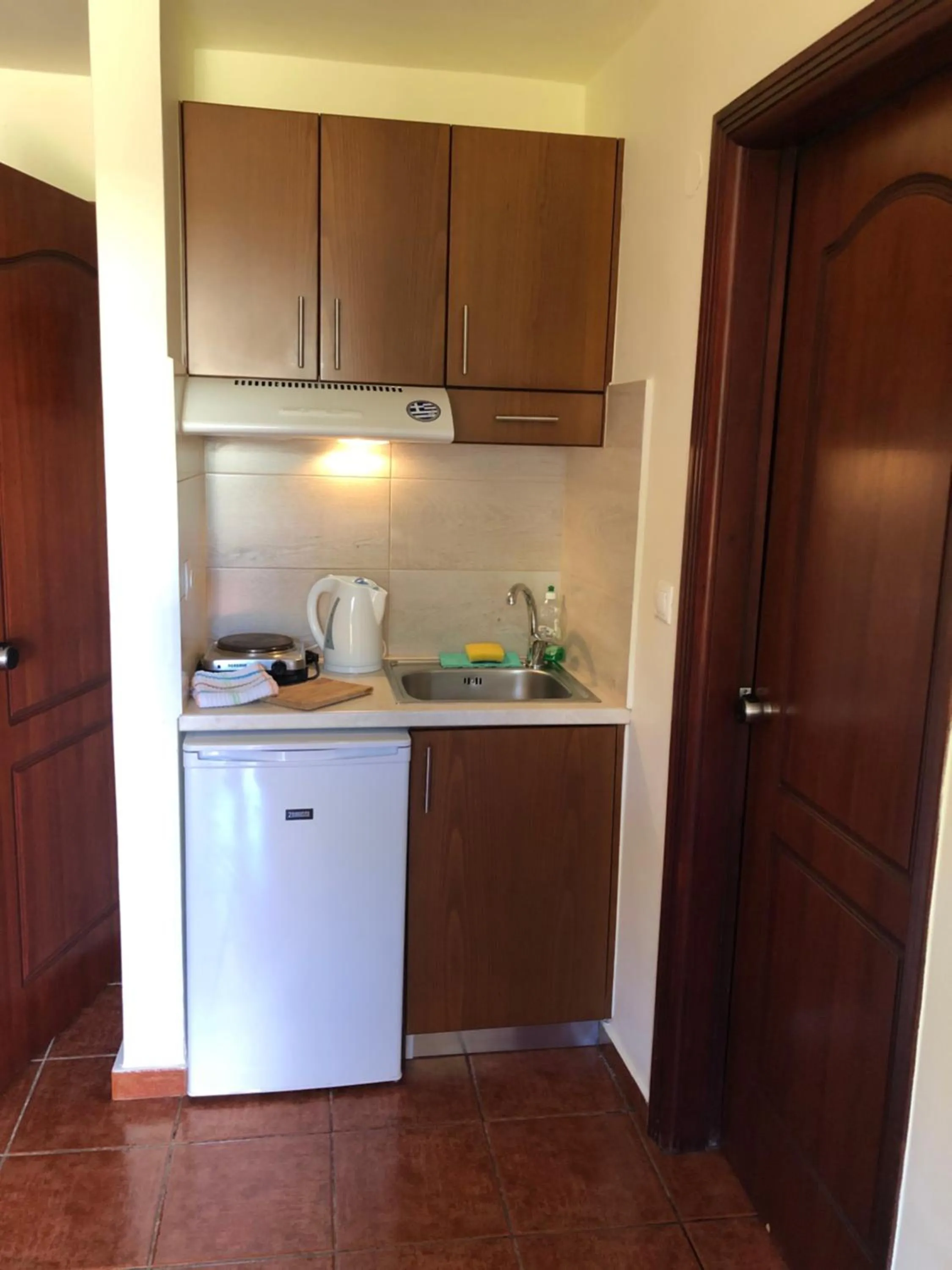 kitchen in Iolkos Hotel Apartments