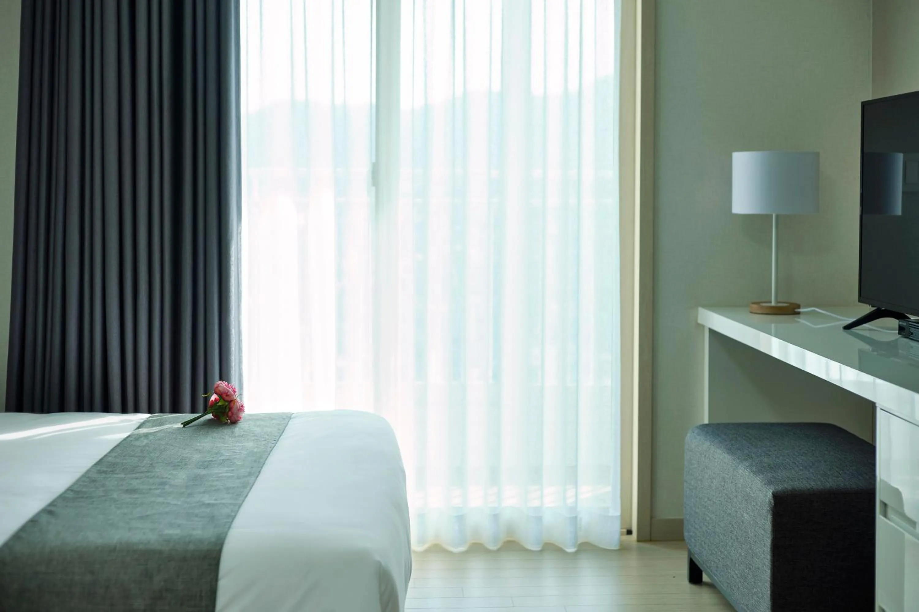 Bed in Geoje Leein Stay Hotel