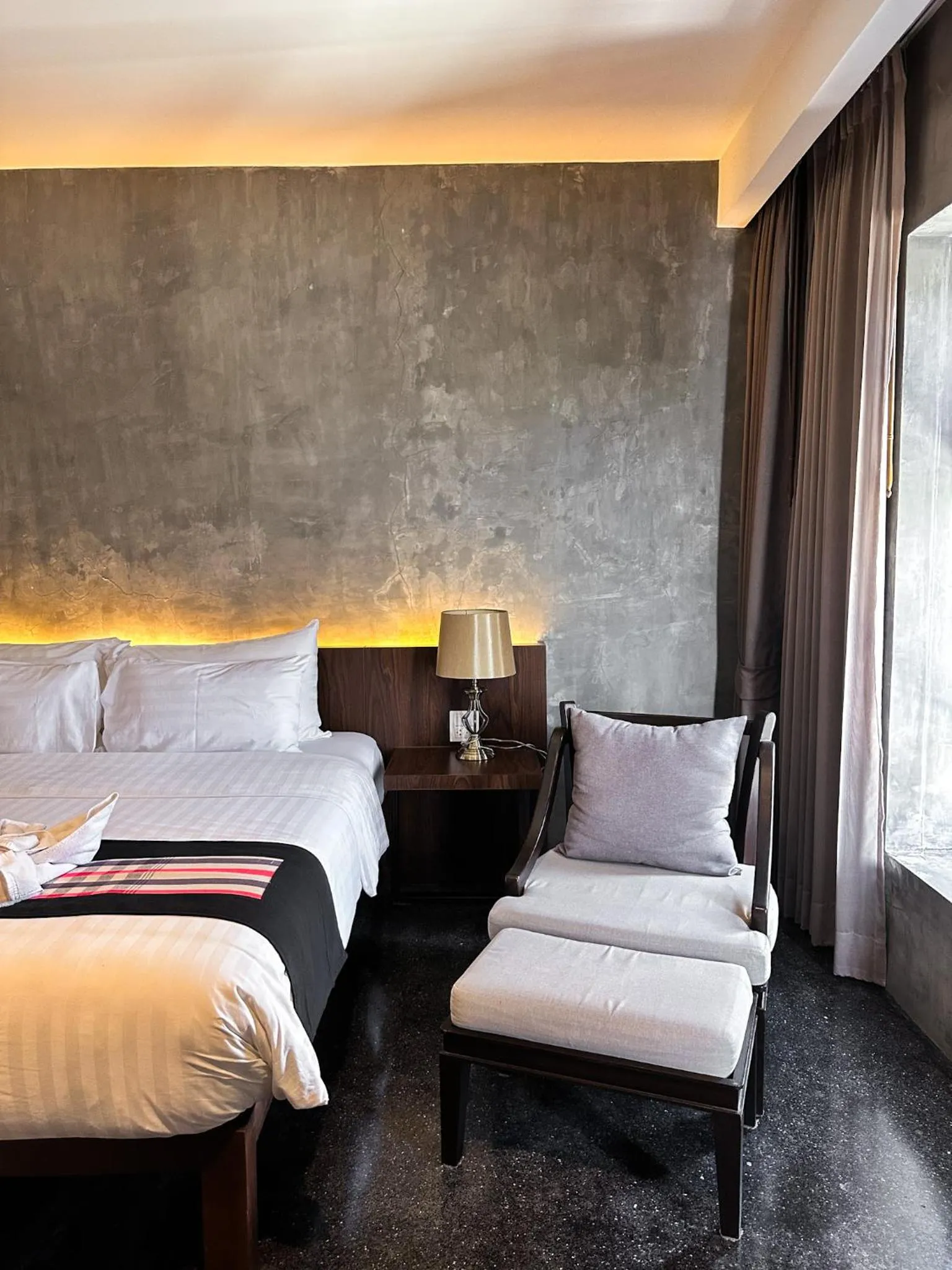 Photo of the whole room, Bed in NAI YA Hotel -SHA Extra Plus