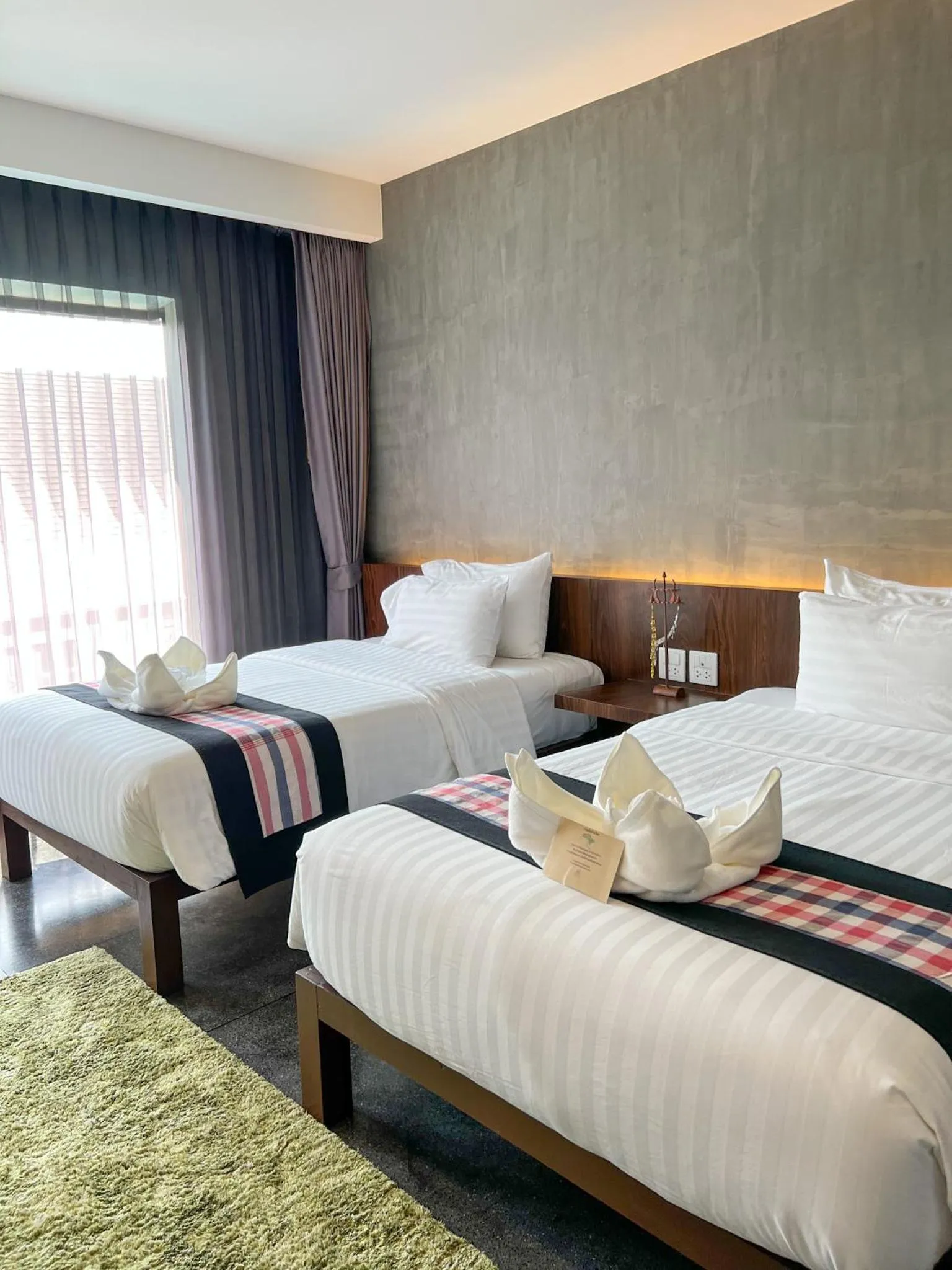 Photo of the whole room, Bed in NAI YA Hotel -SHA Extra Plus