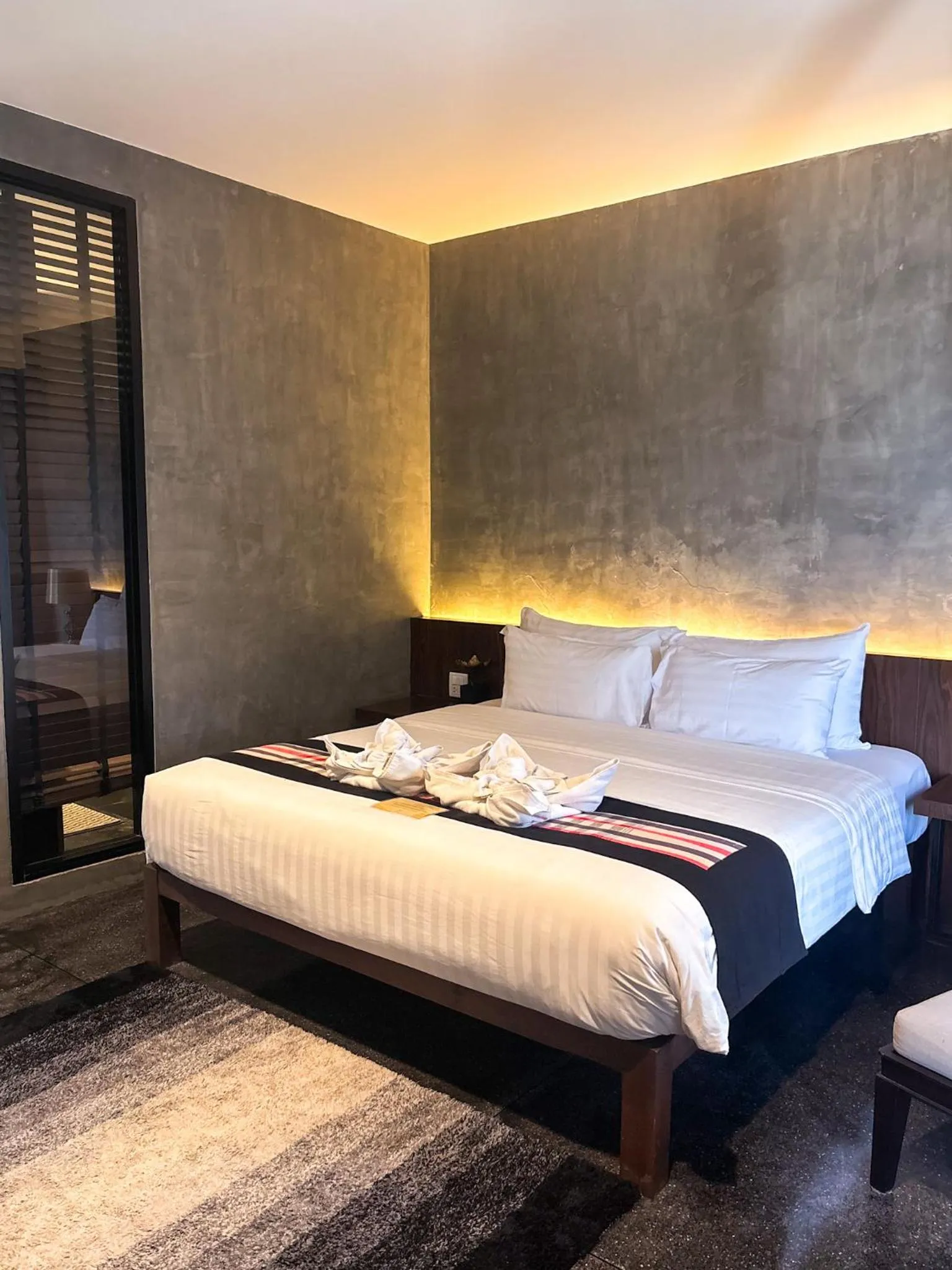 Photo of the whole room, Bed in NAI YA Hotel -SHA Extra Plus