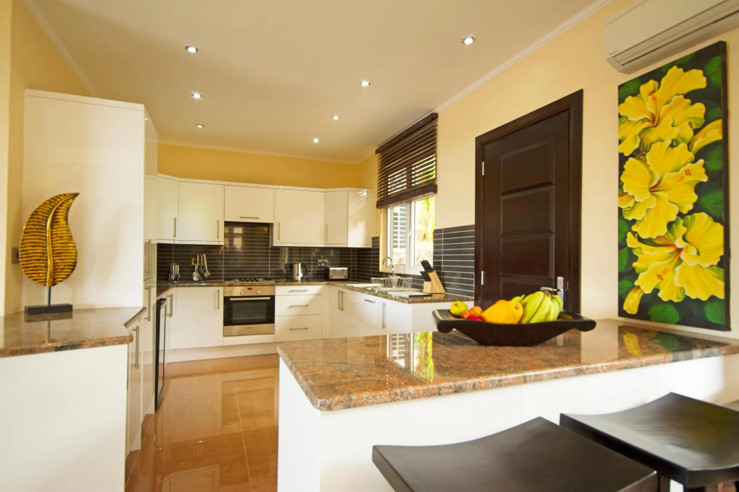 Kitchen or kitchenette in The Palm Seychelles