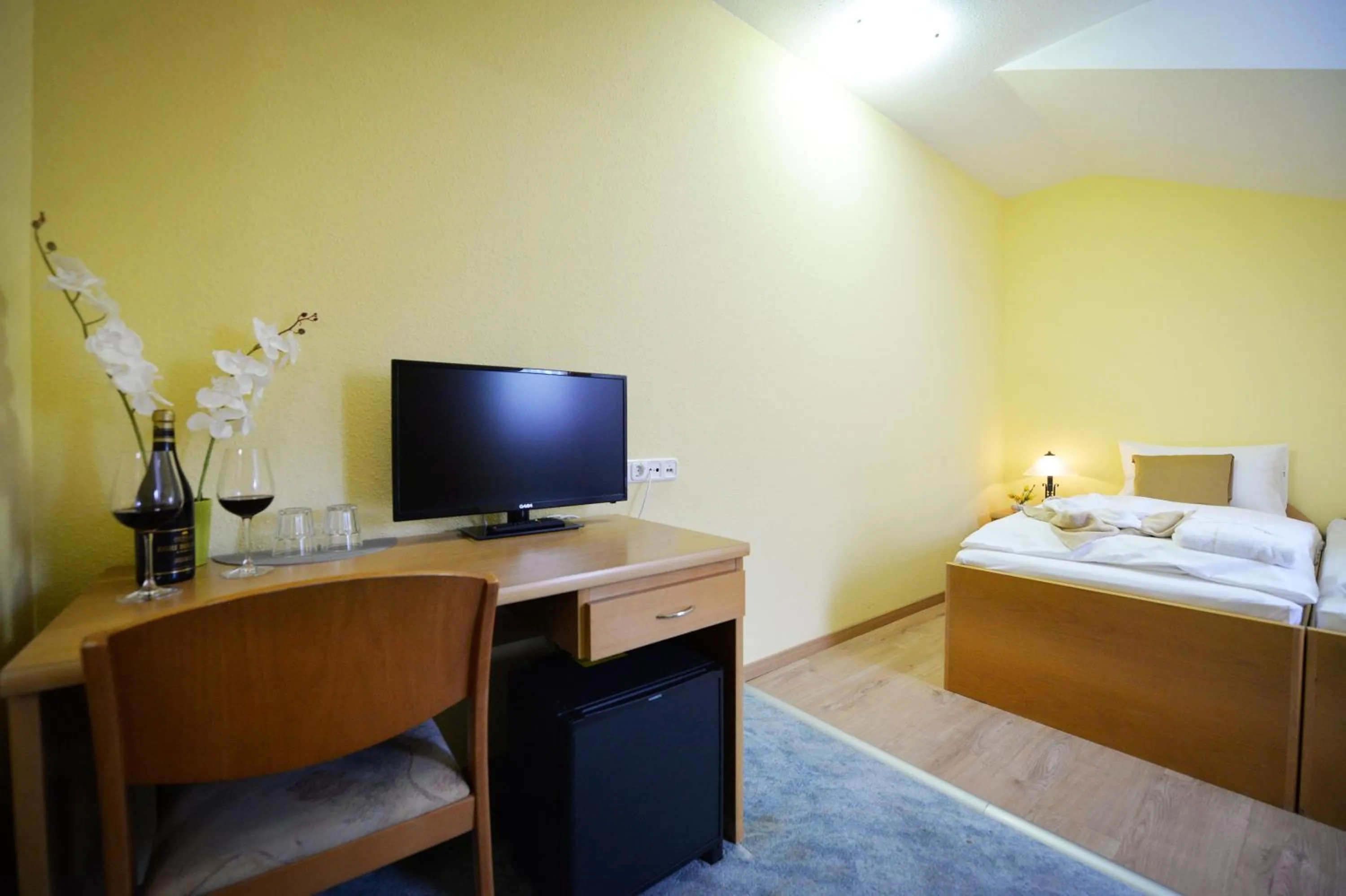 Seating area, Bed in Panorama Hotel Noszvaj