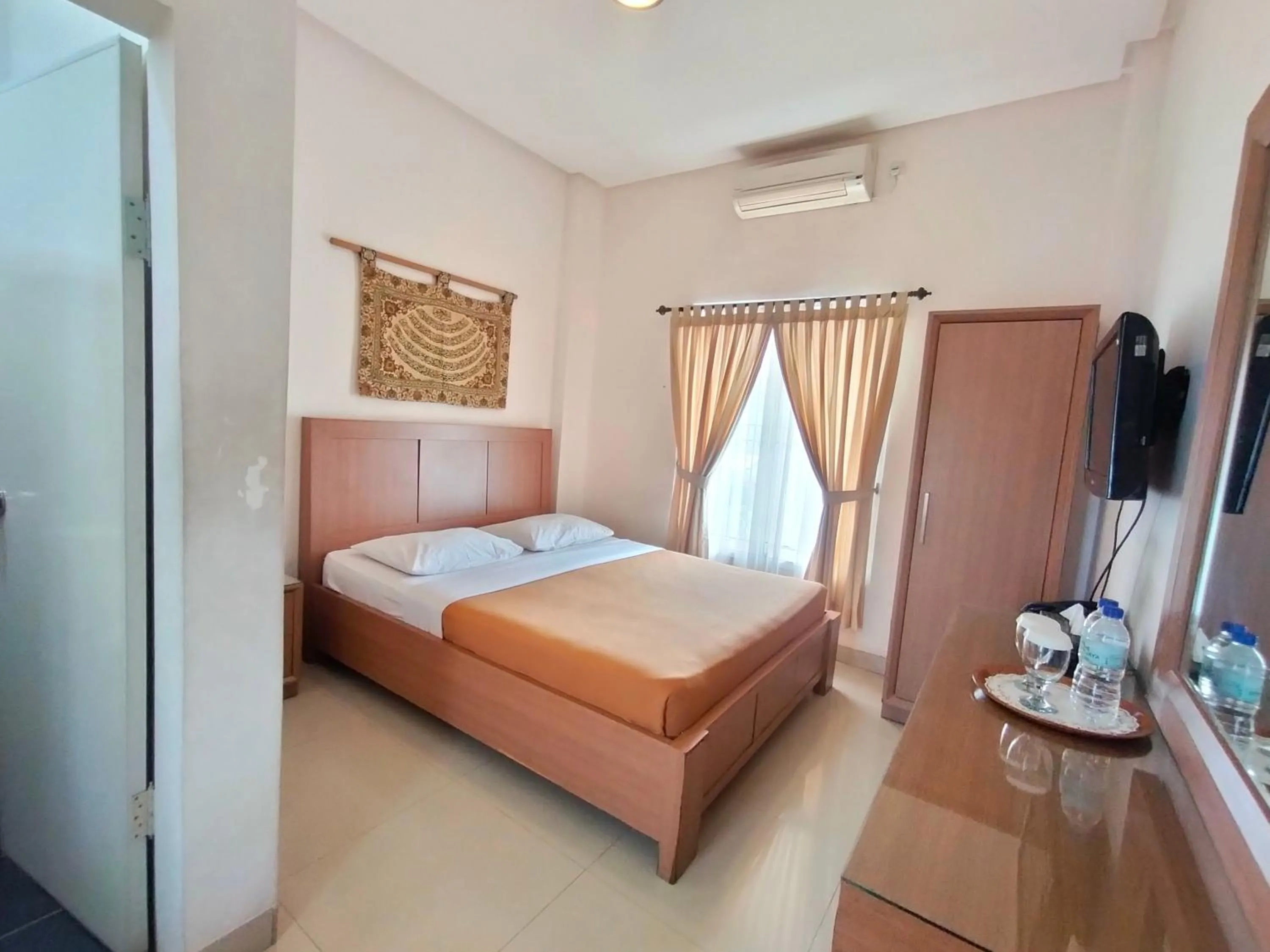 Bed in The Sriwijaya Hotel - Halal Hotel