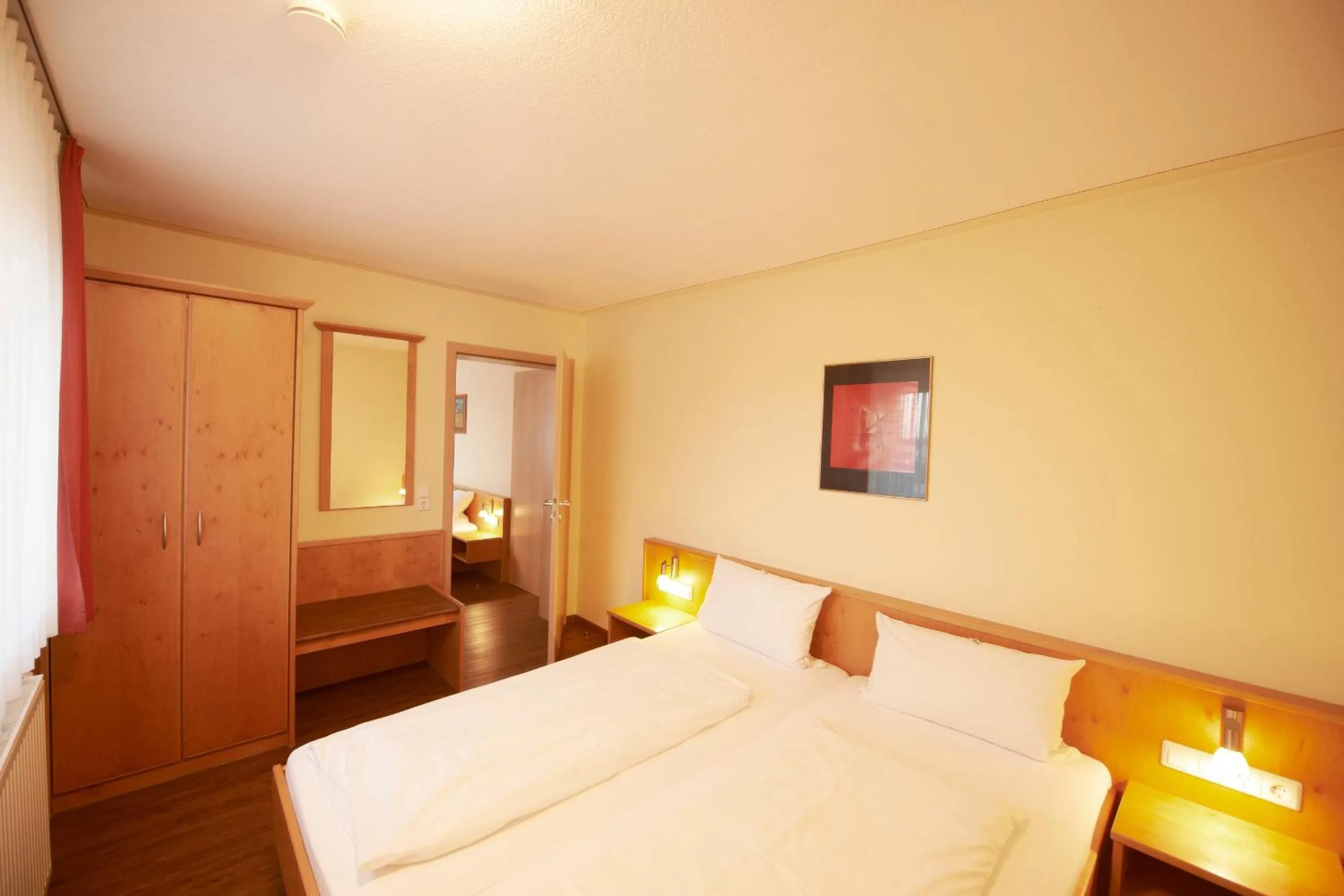 Photo of the whole room, Bed in Autenrieder Gästehaus Schlossbräu