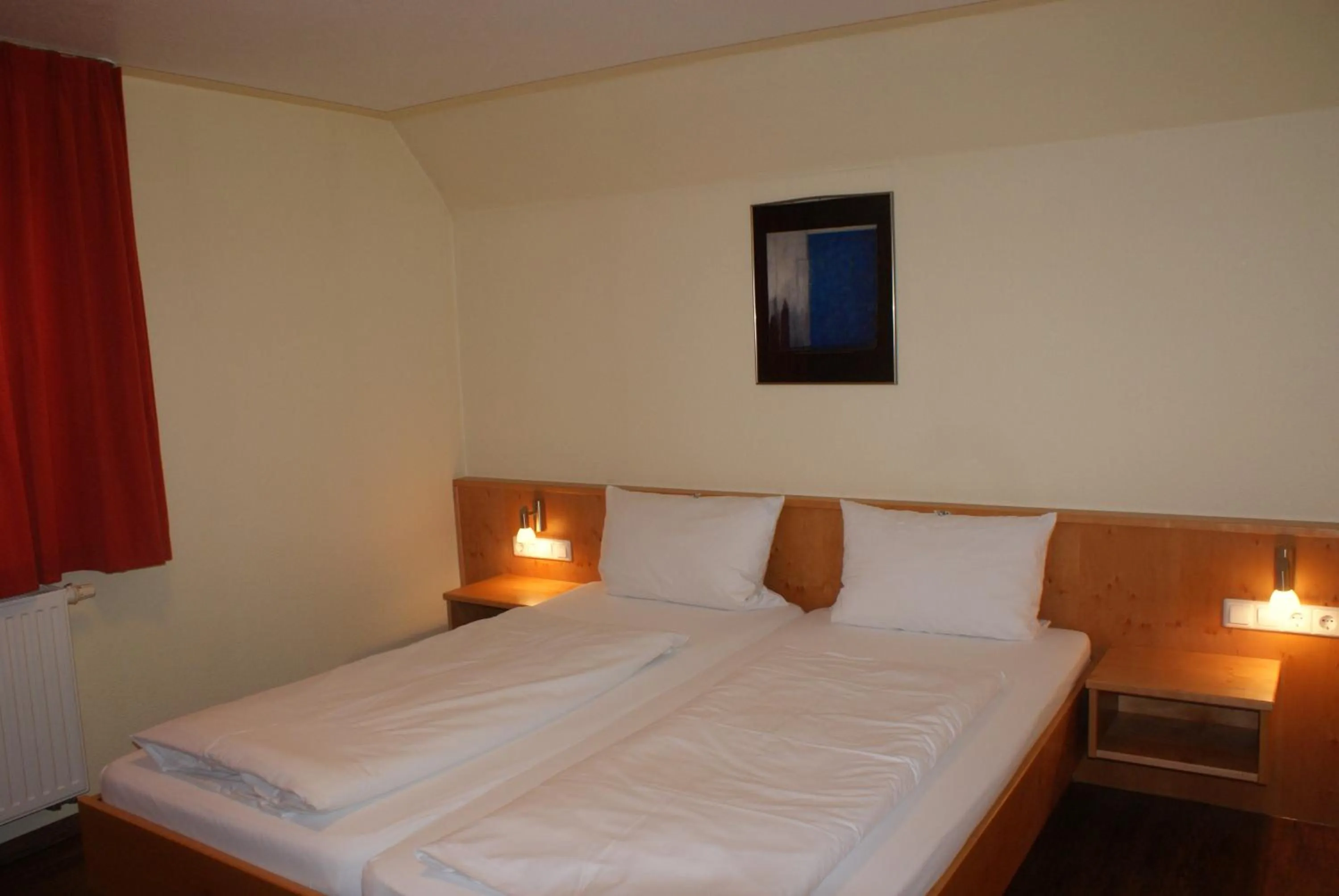 Photo of the whole room, Bed in Autenrieder Gästehaus Schlossbräu