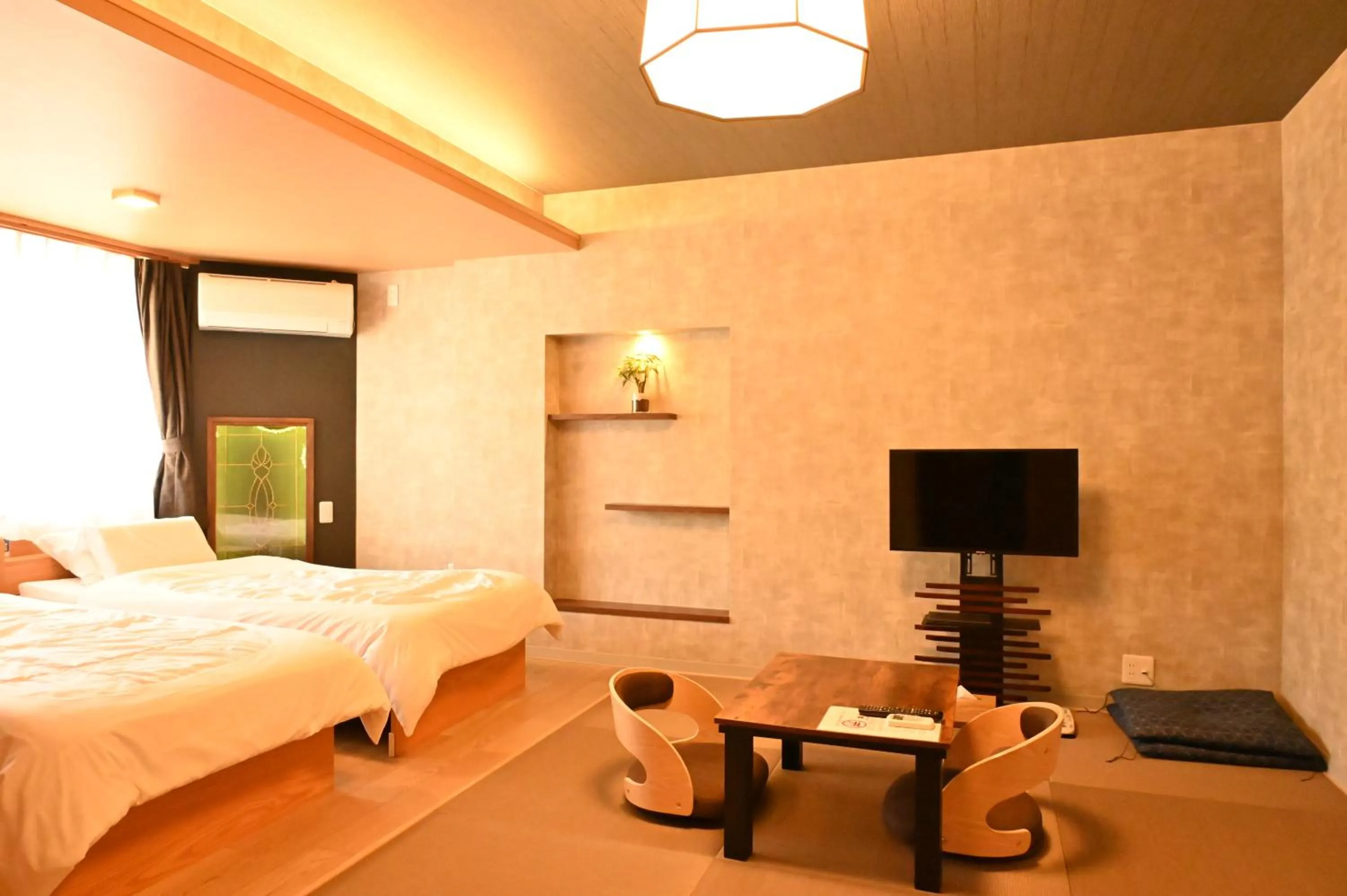 Bed in Unzen Sky Hotel