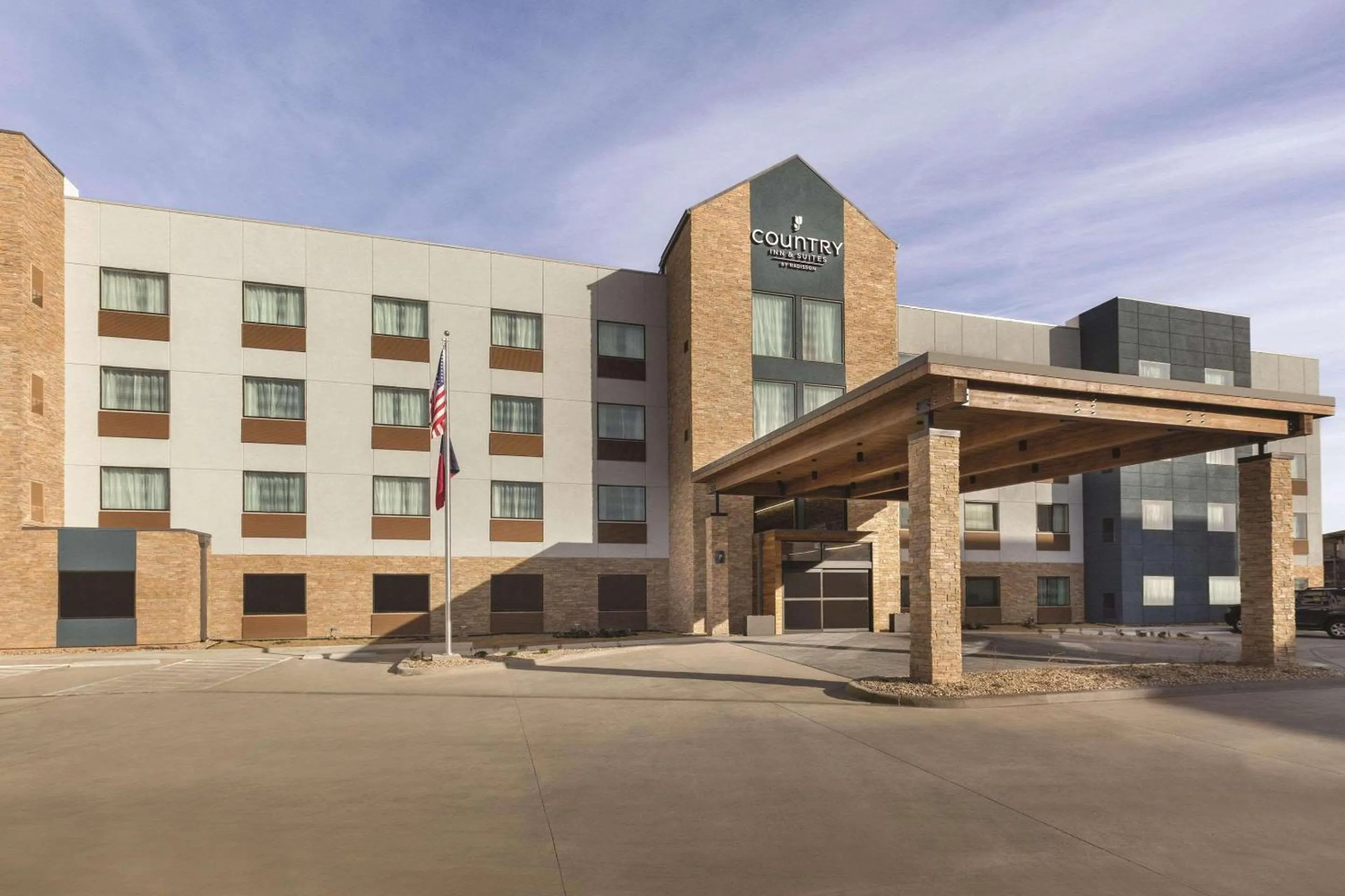 Property building in Country Inn & Suites by Radisson, Lubbock Southwest, TX