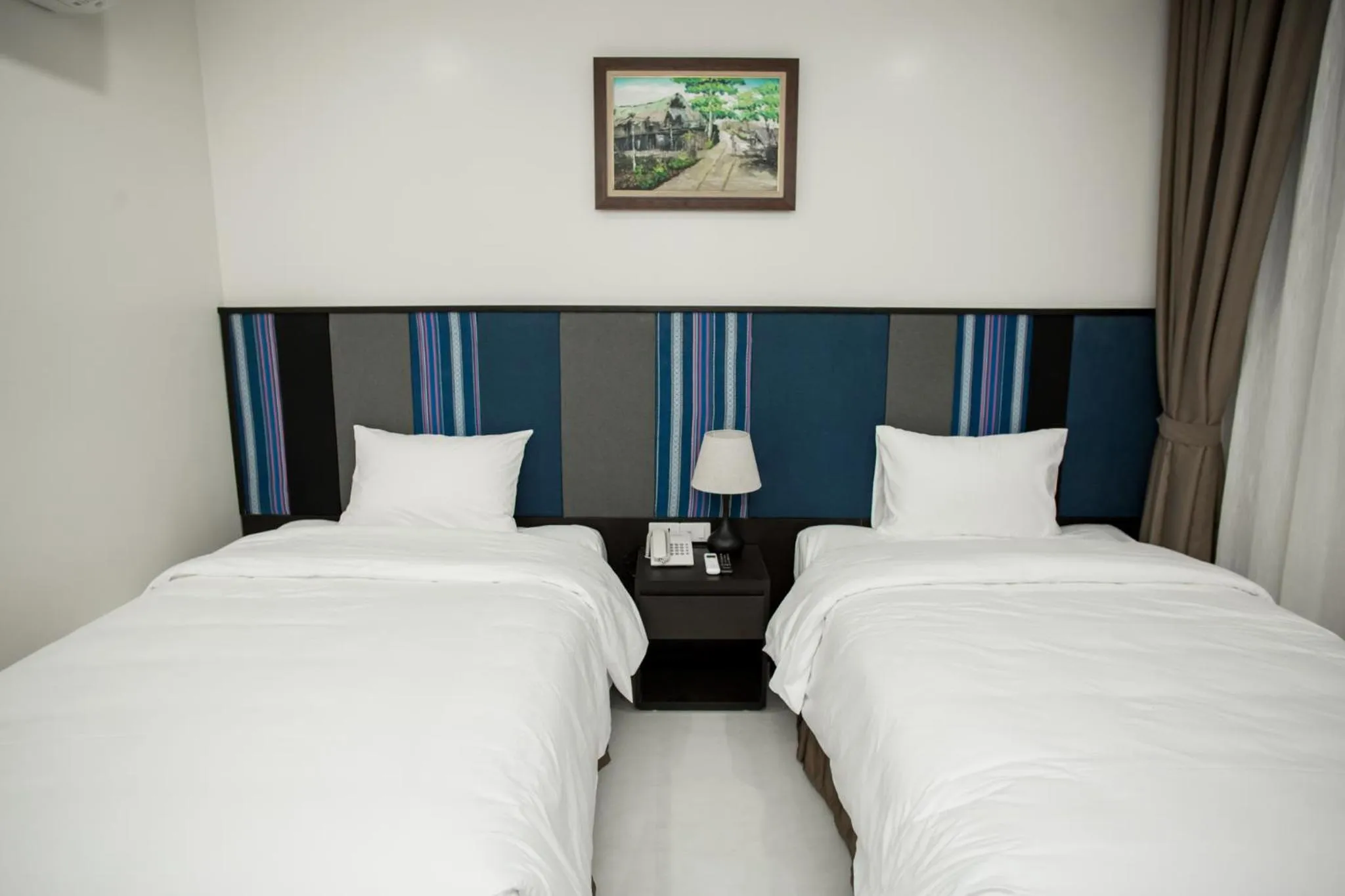 Bed in Max Boutique Hotel