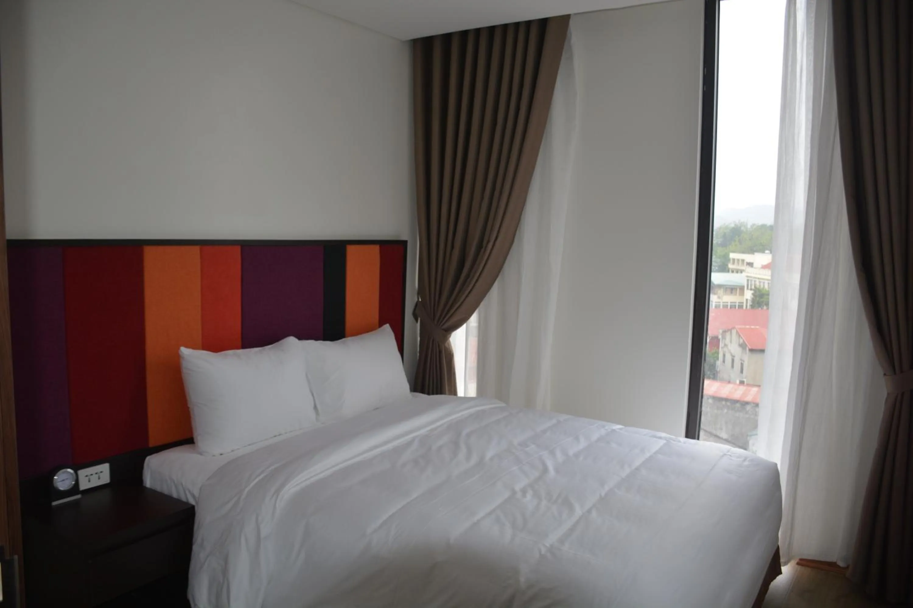 Bed in Max Boutique Hotel