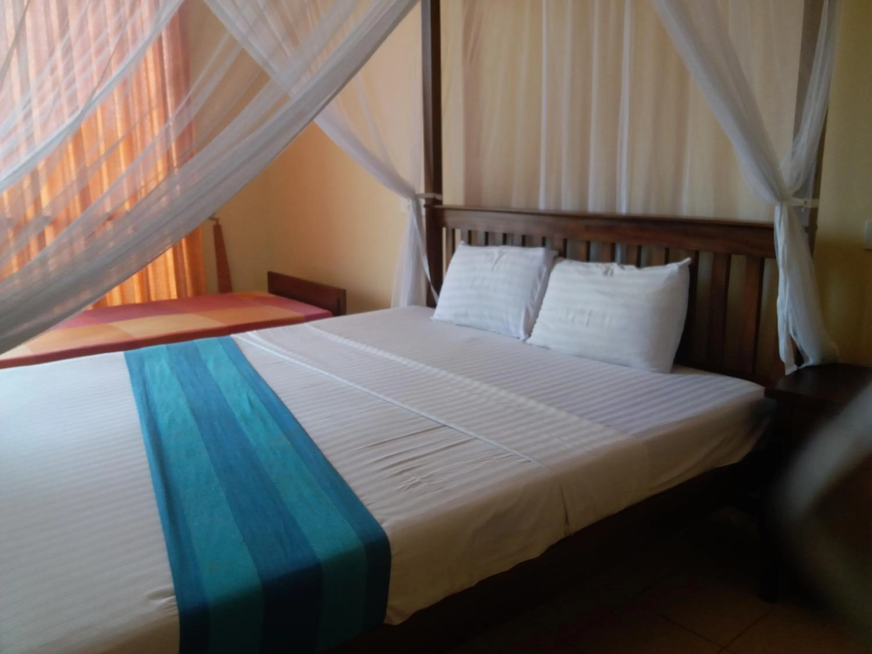 Bed in Hotel Marine at Negombo Beach