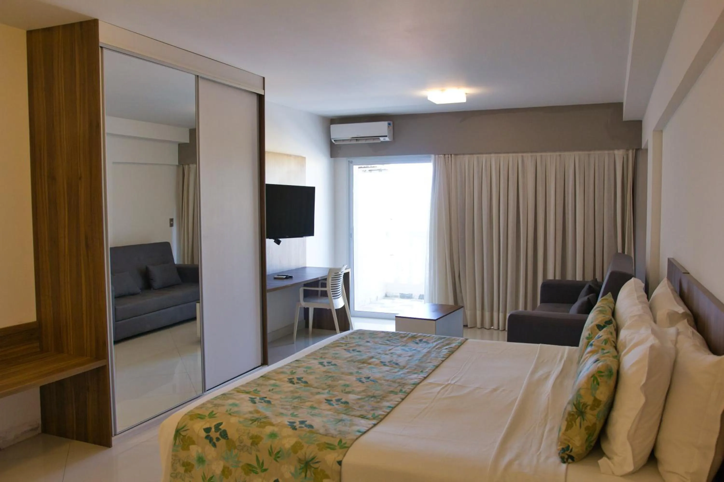 Bed in Kristie Resort Natal Hotel