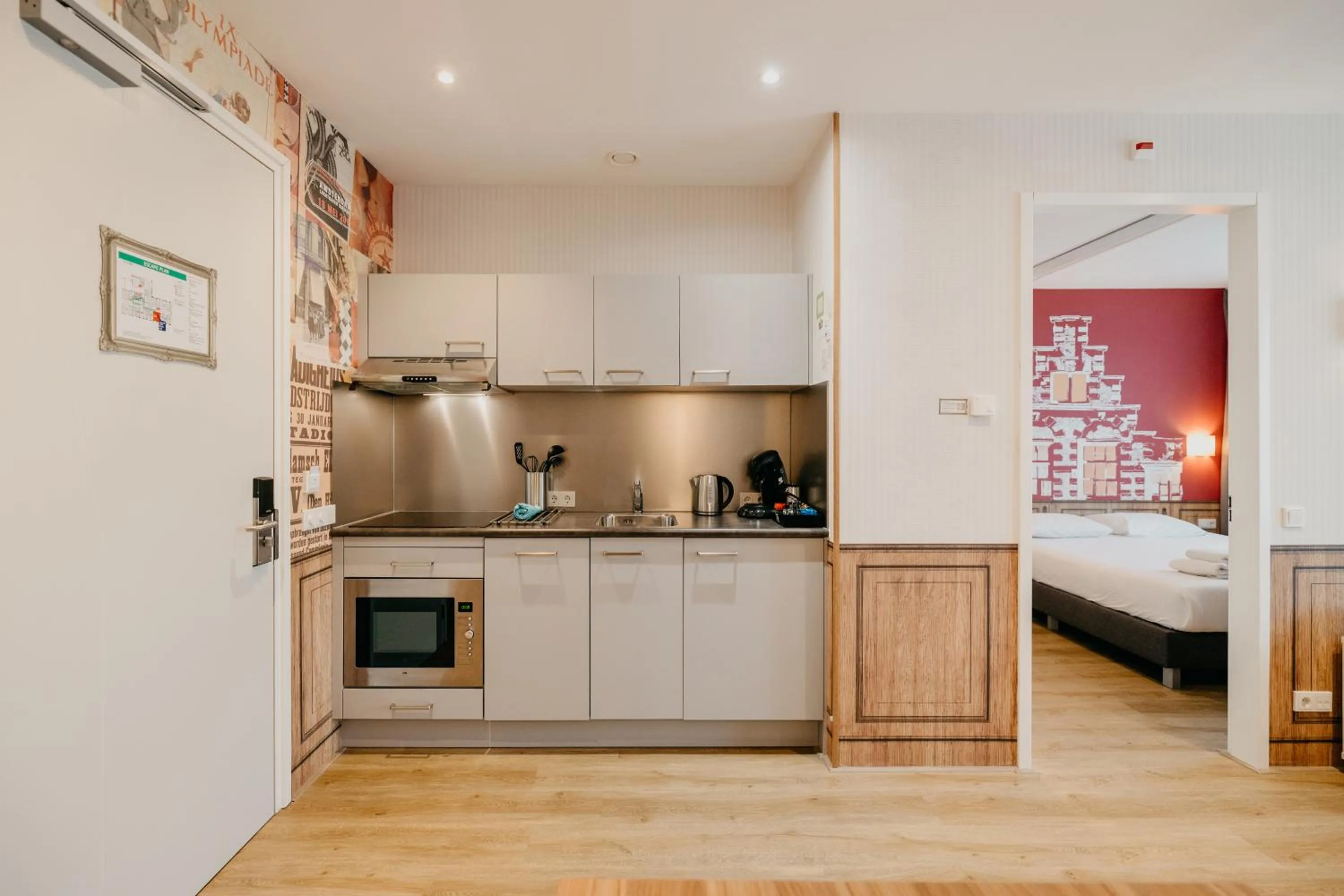 Kitchen or kitchenette, Bed in Amsterdam ID Aparthotel