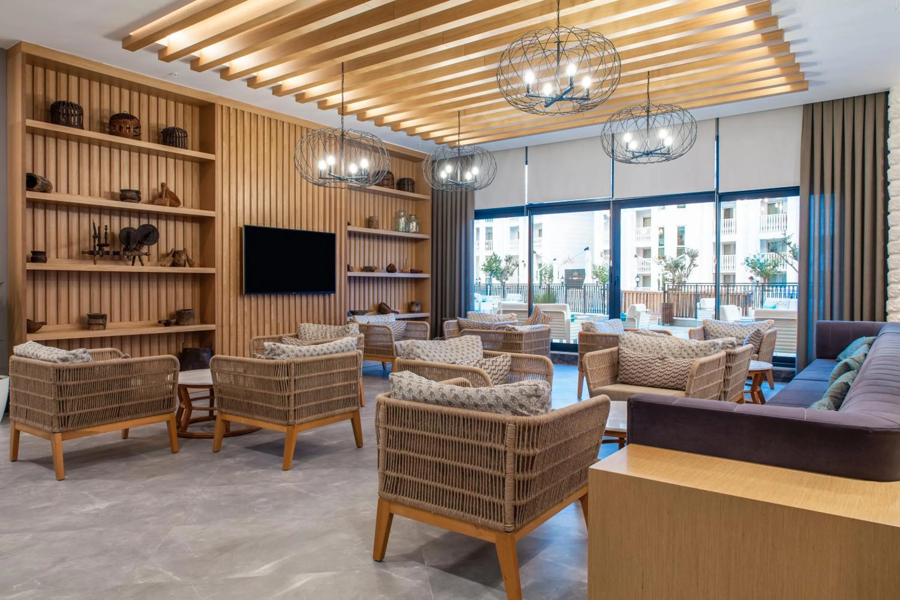 Communal lounge/ TV room in Side Royal Style Hotel