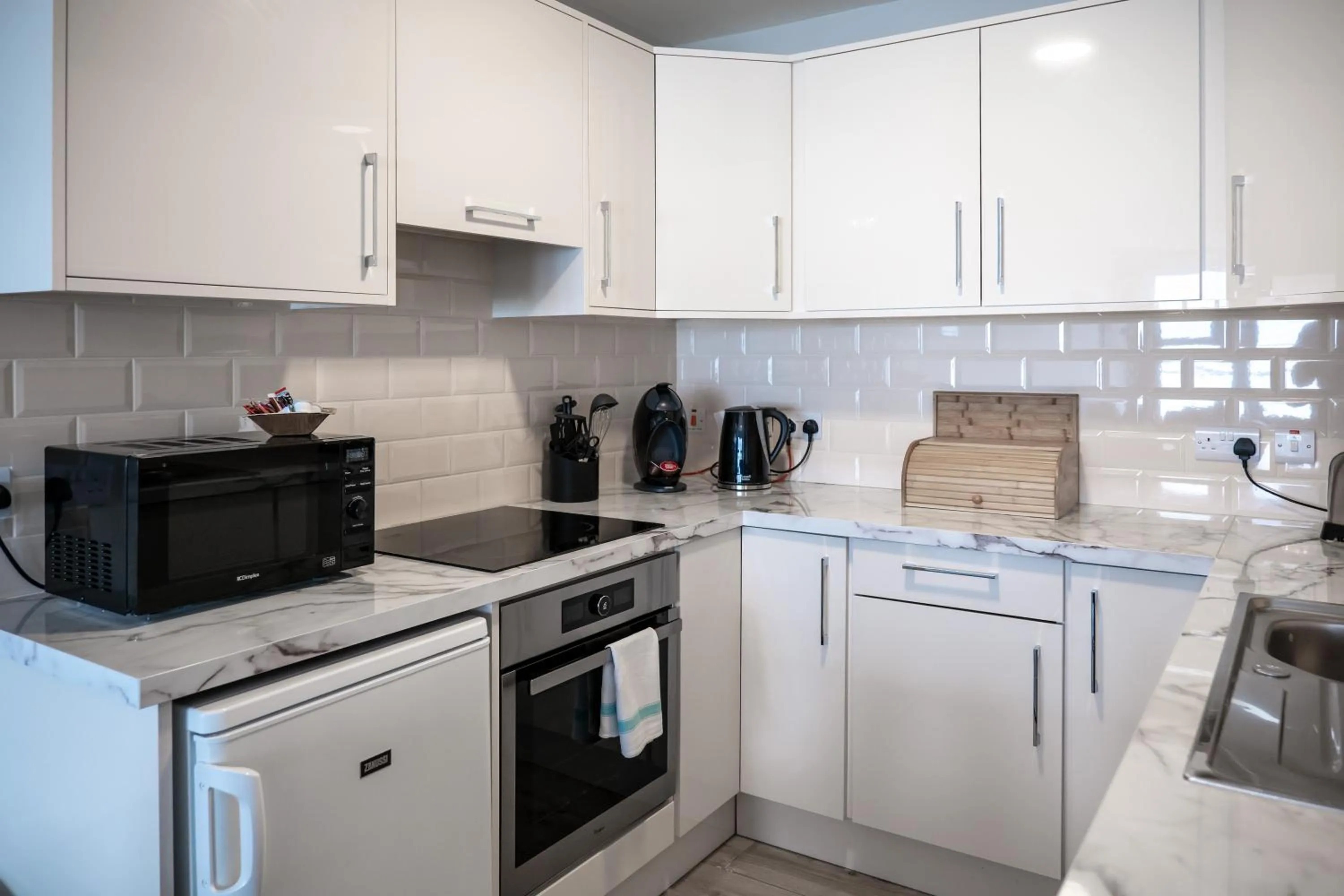 Kitchen or kitchenette in Galway Bay Sea View Apartments