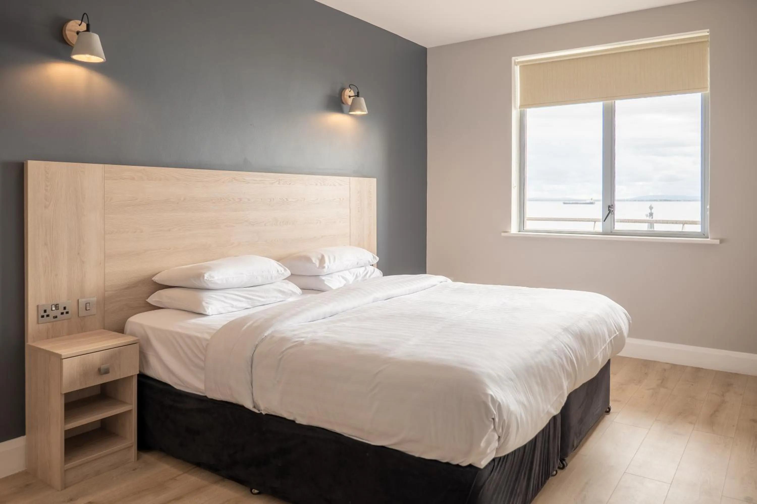 Bed in Galway Bay Sea View Apartments