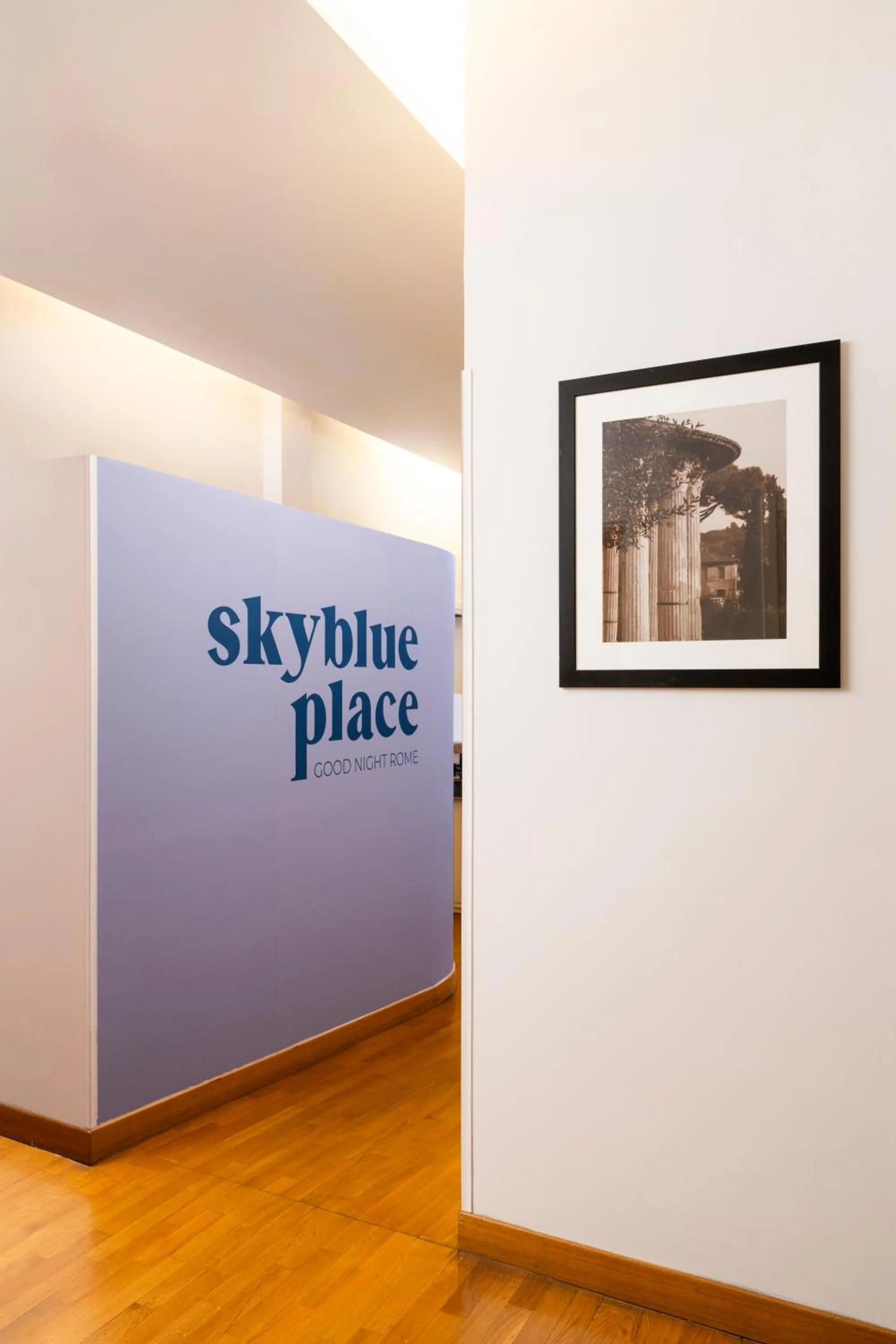 Property logo or sign in Sky Blue Place Rome