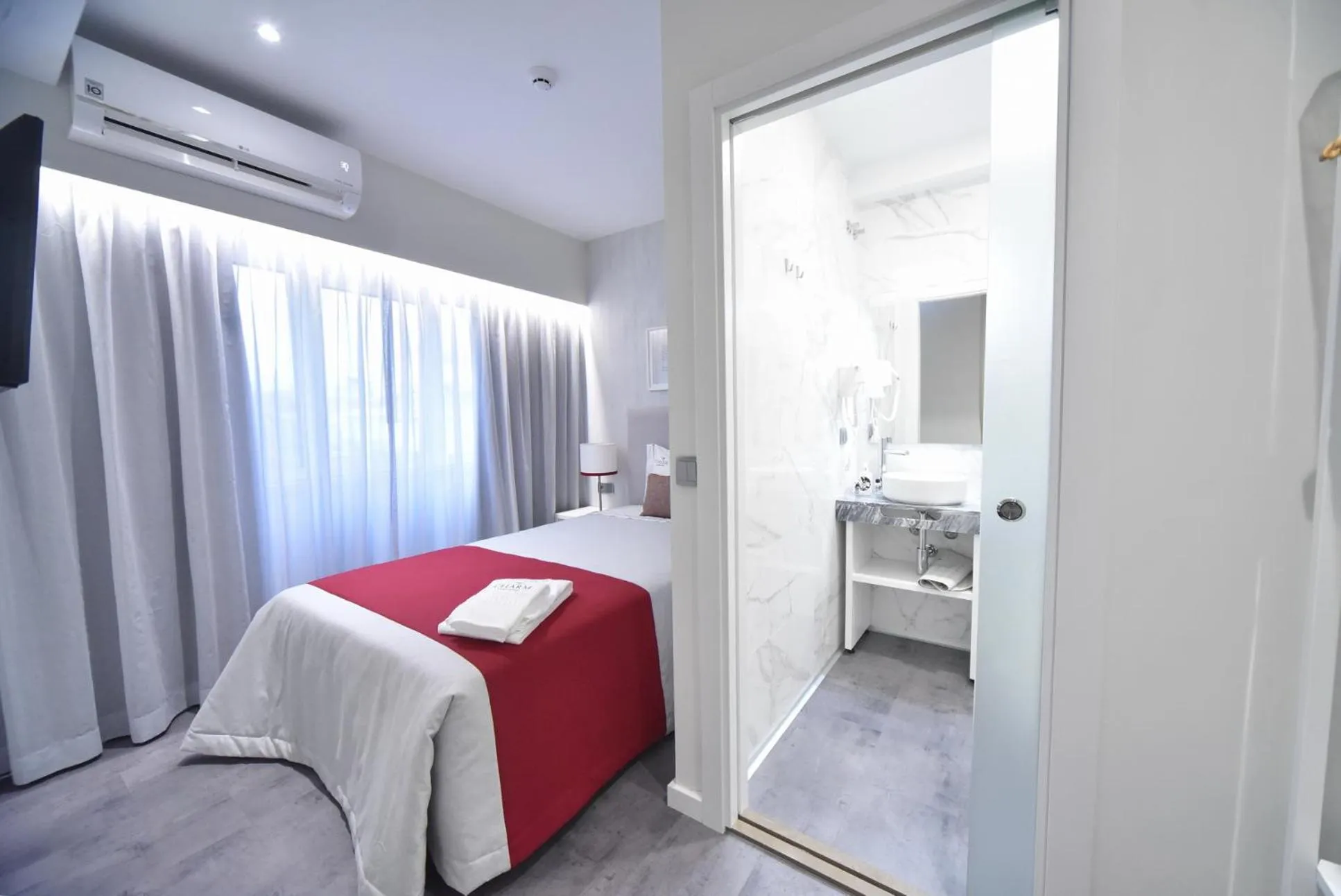 Bed in My Charm Lisbon Suites