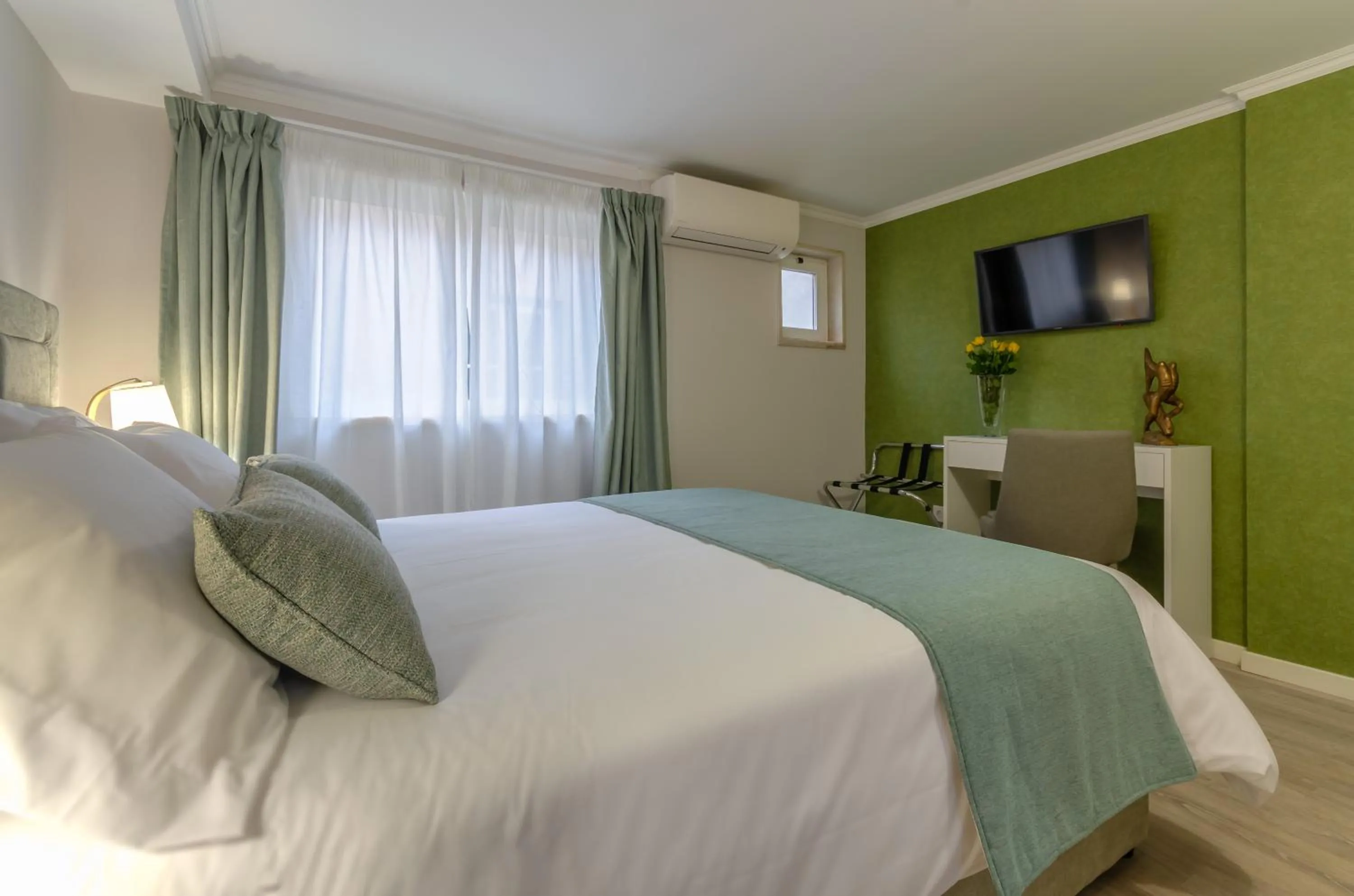 Bed in Ver Belém Suites