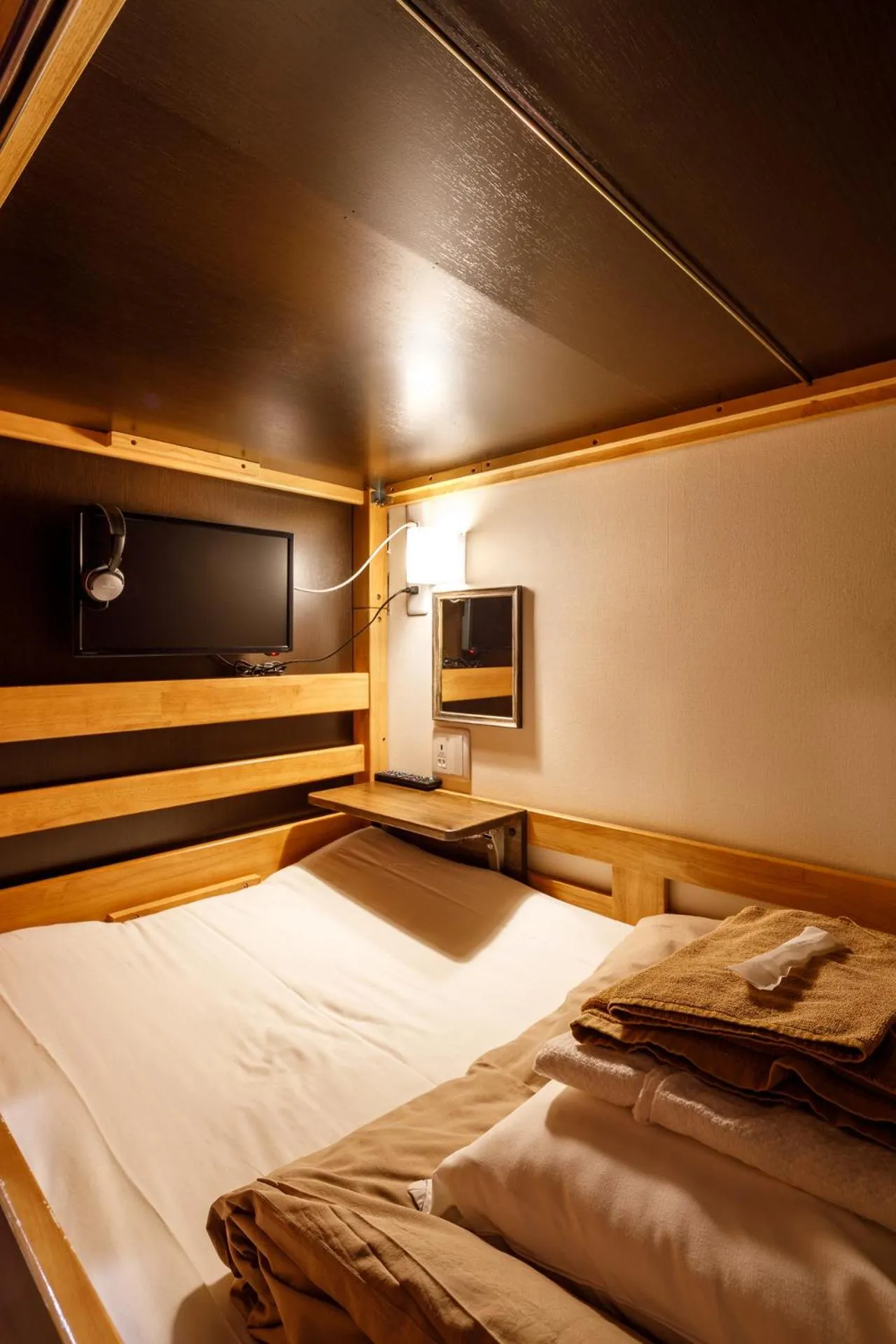 Bed in Hotel Owl Tokyo Shinbashi