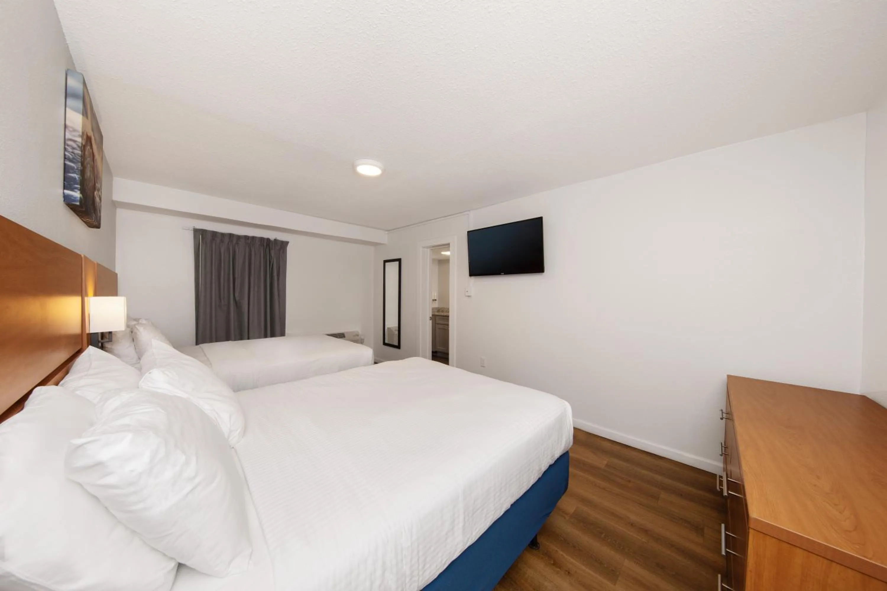 Bed in Chateau Beachfront Hotel, a By the Sea Resort