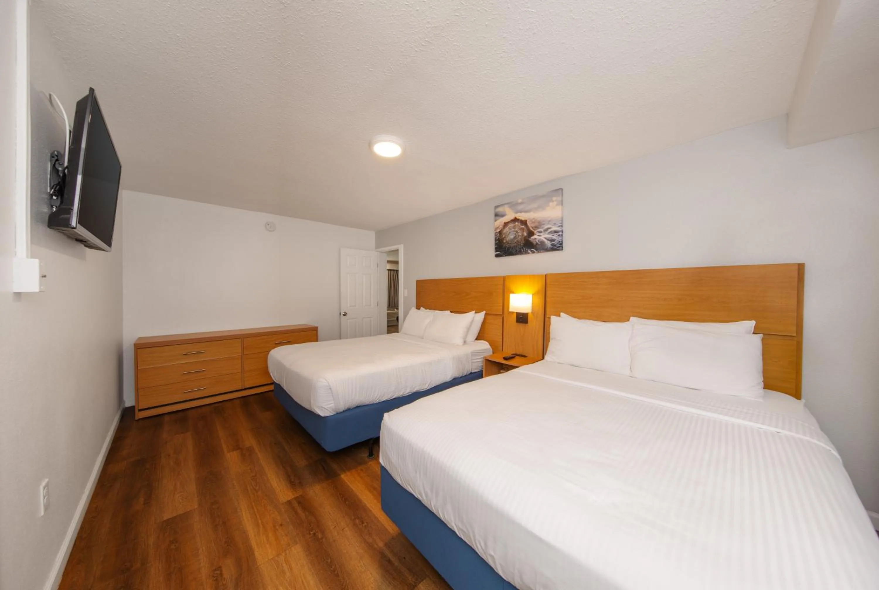 Bed in Chateau Beachfront Hotel, a By the Sea Resort