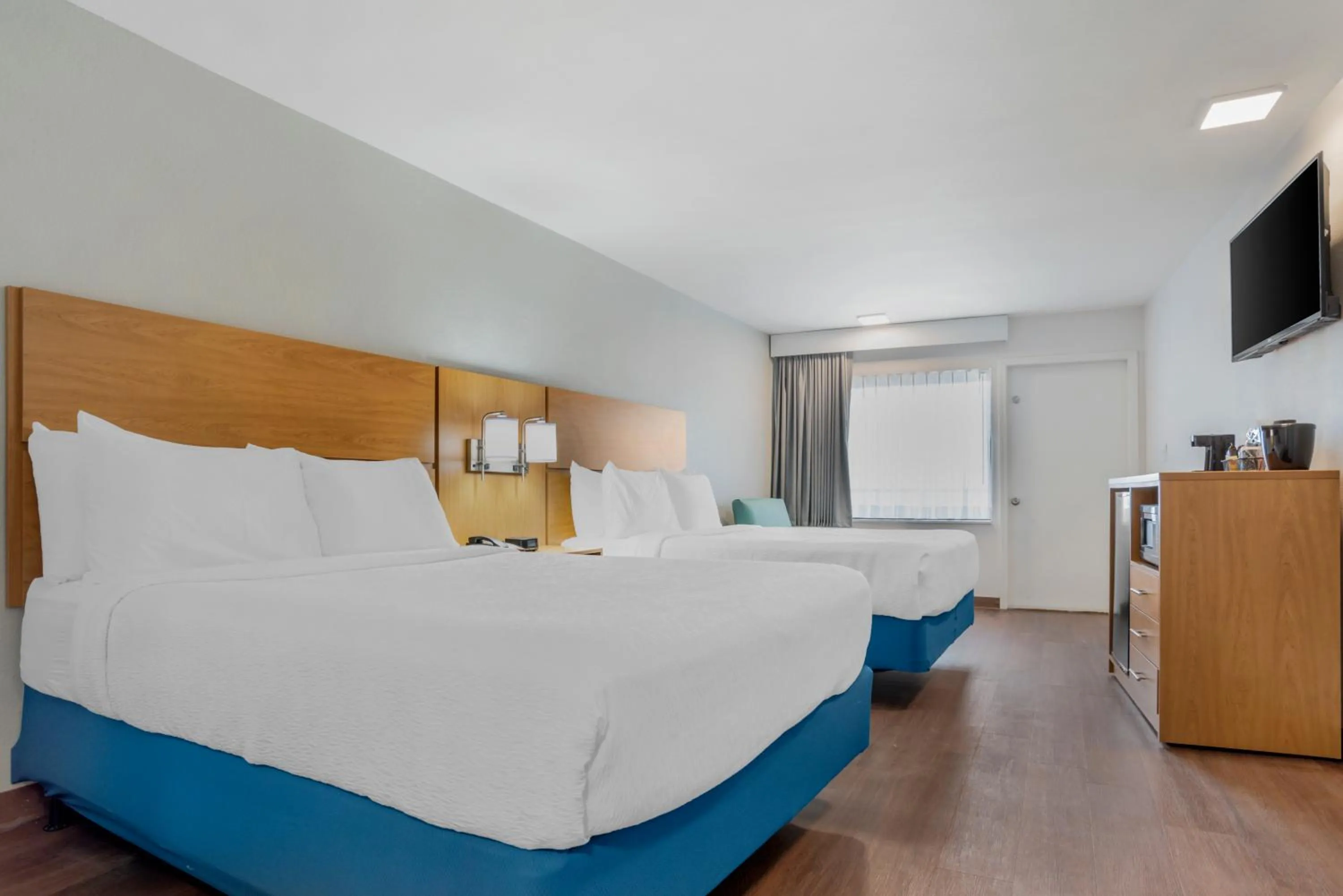 Bed in Chateau Beachfront Hotel, a By the Sea Resort