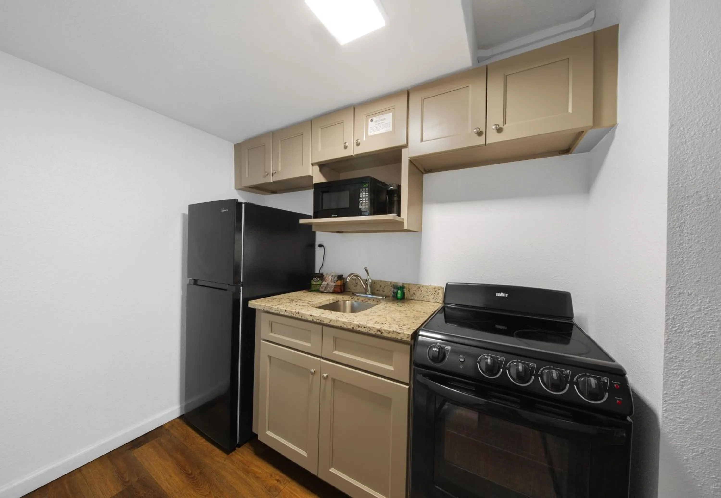 Kitchen or kitchenette in Chateau Beachfront Hotel, a By the Sea Resort