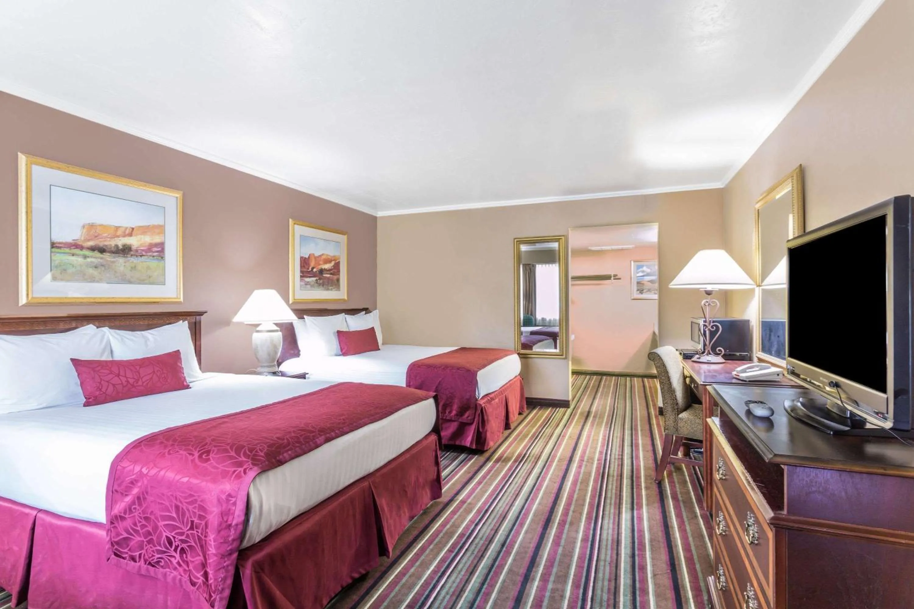 Photo of the whole room, Bed in Days Inn & Suites by Wyndham Logan