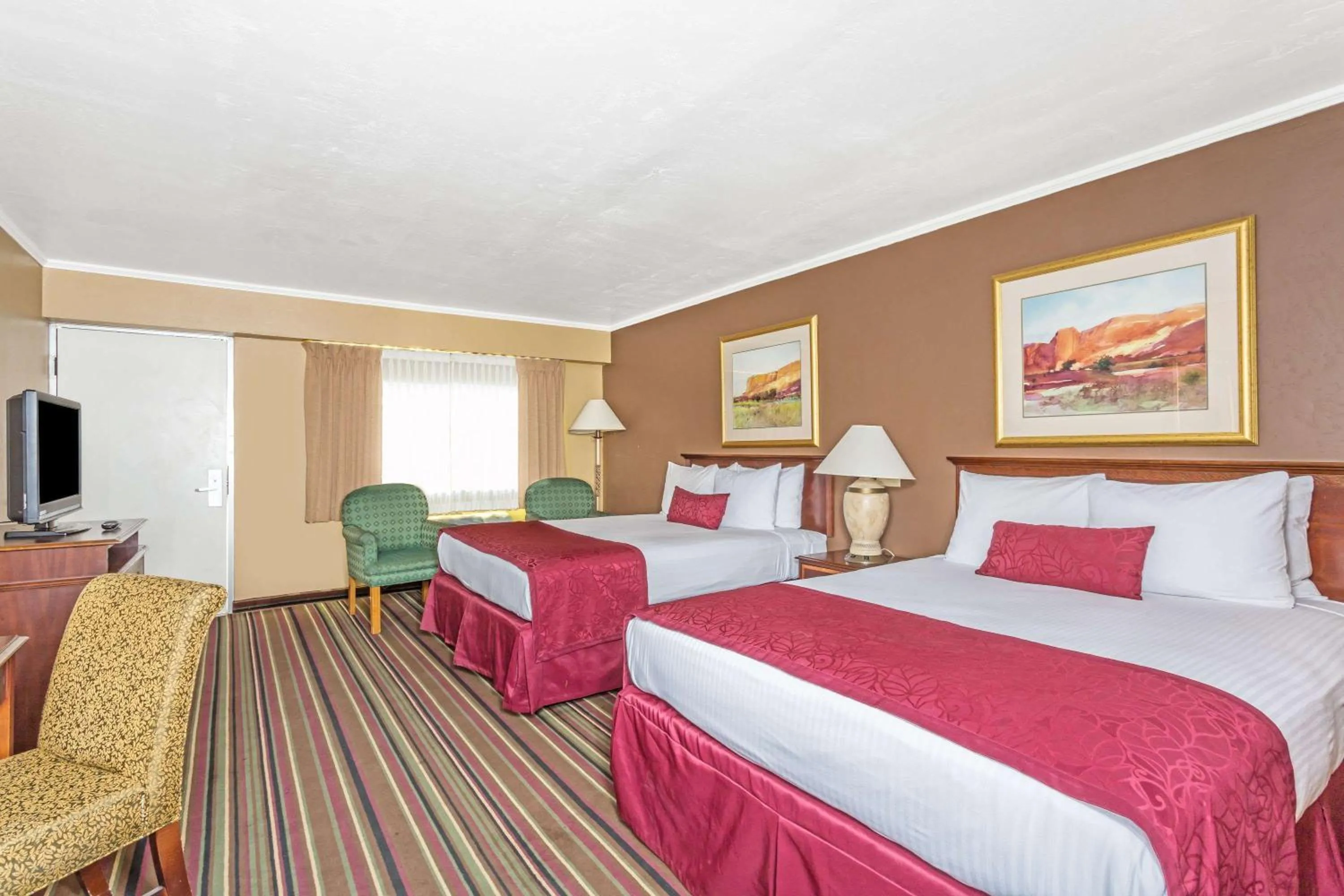 Photo of the whole room, Bed in Days Inn & Suites by Wyndham Logan