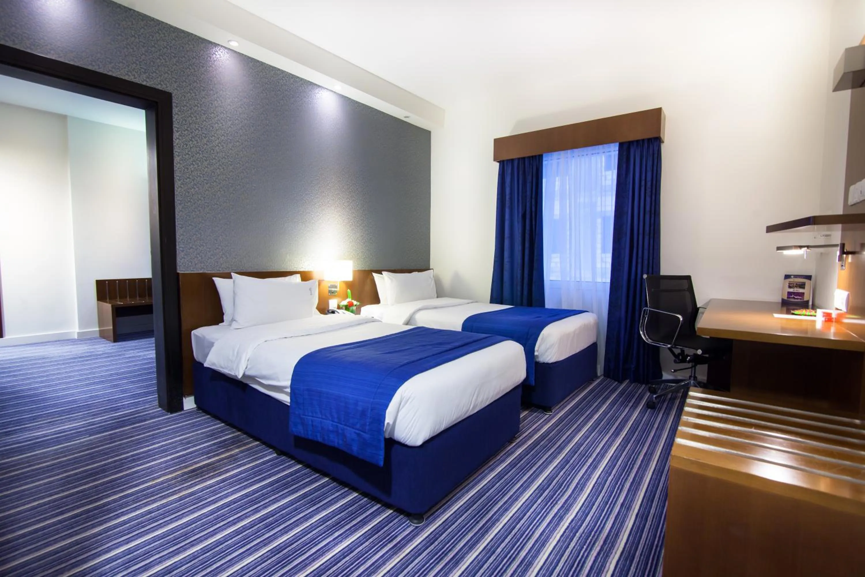 Bed in Holiday Bahrain Hotel