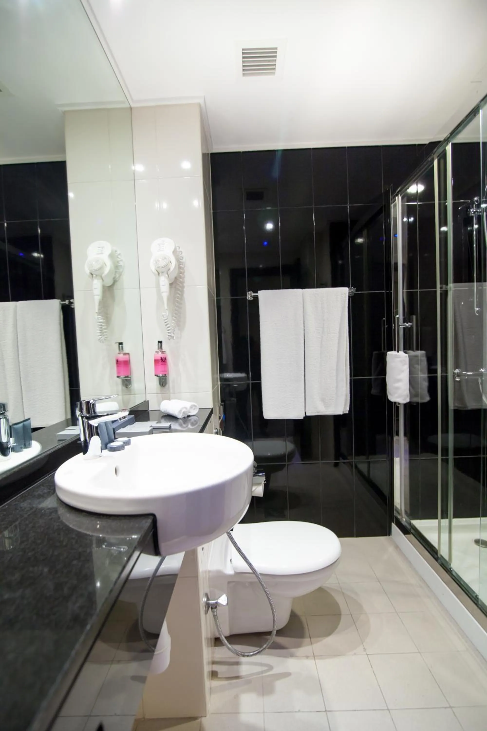 Bathroom in Holiday Bahrain Hotel