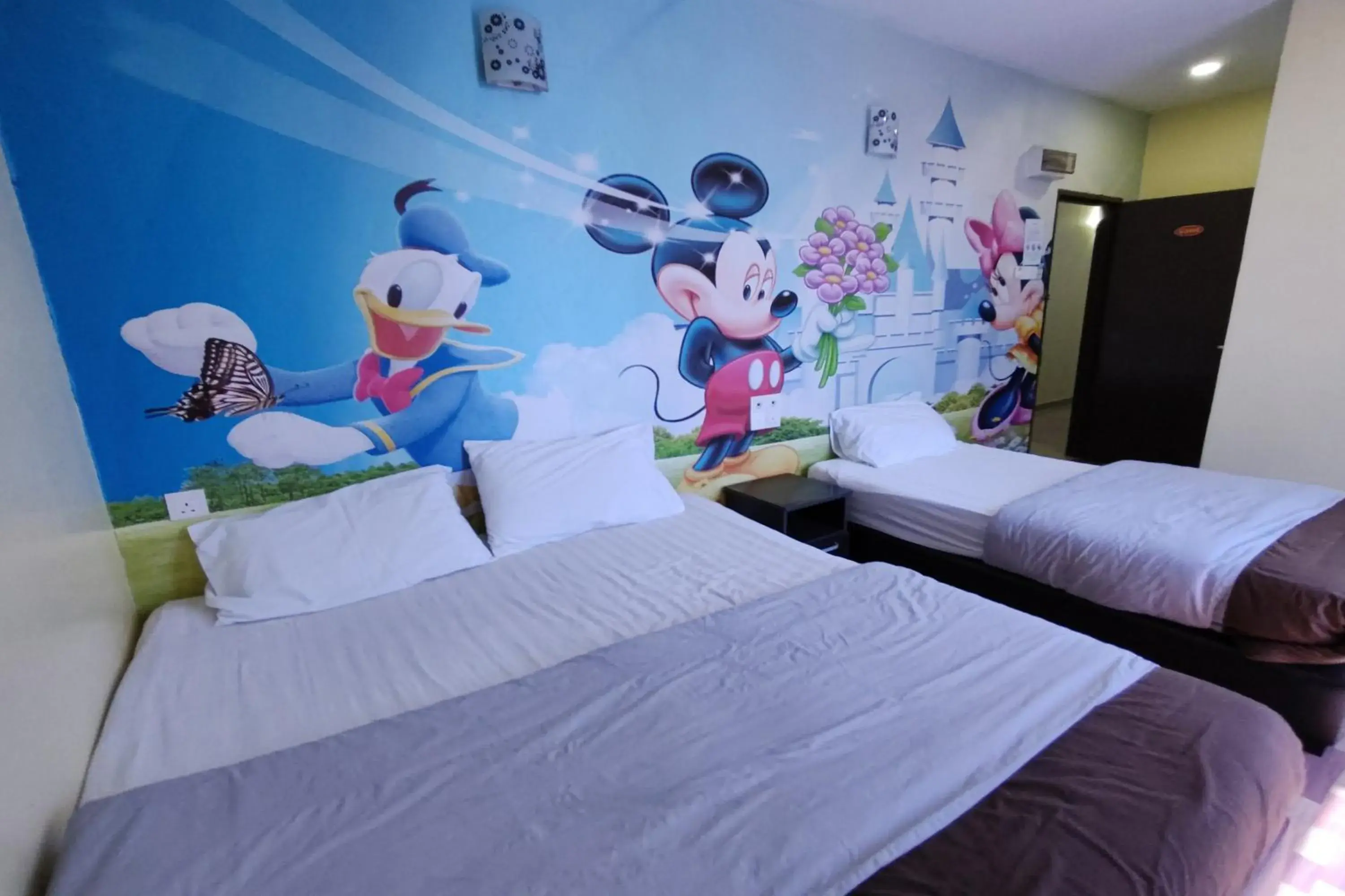 Budget Triple Room in OYO 43934 Nova Hotel Budget Triple Room in OYO 43934 Nova Hotel