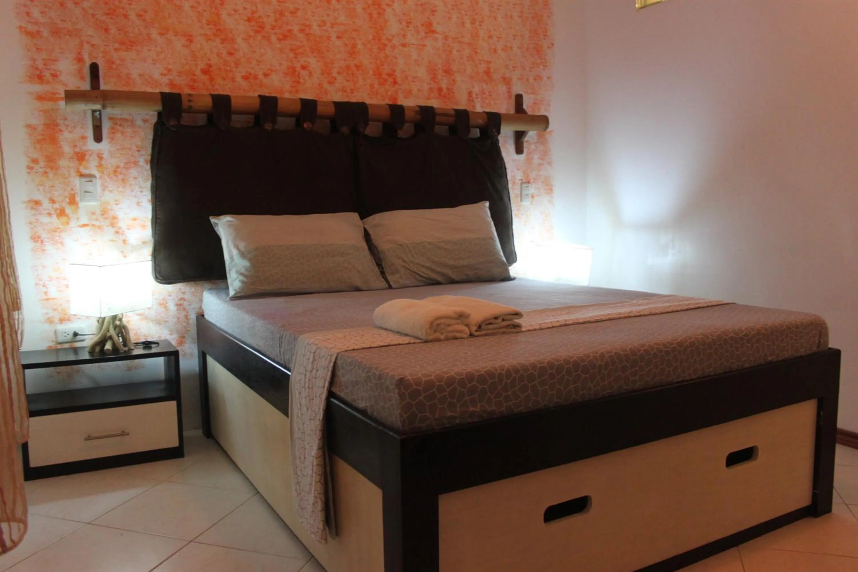 Bed in Vanilla Sky Dive Resort