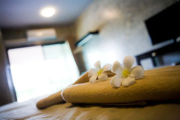 Bed in Baan Suan Ramita Resort