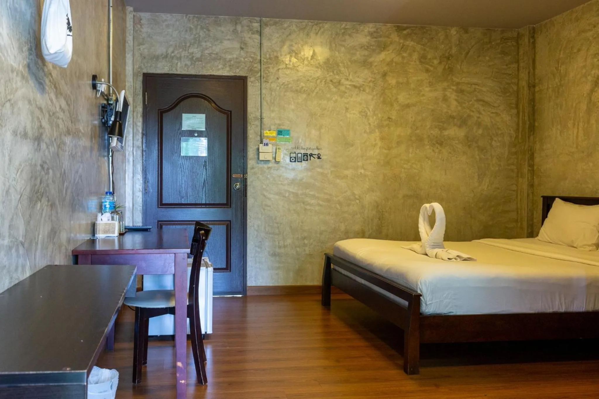 Bed in Baan Suan Ramita Resort