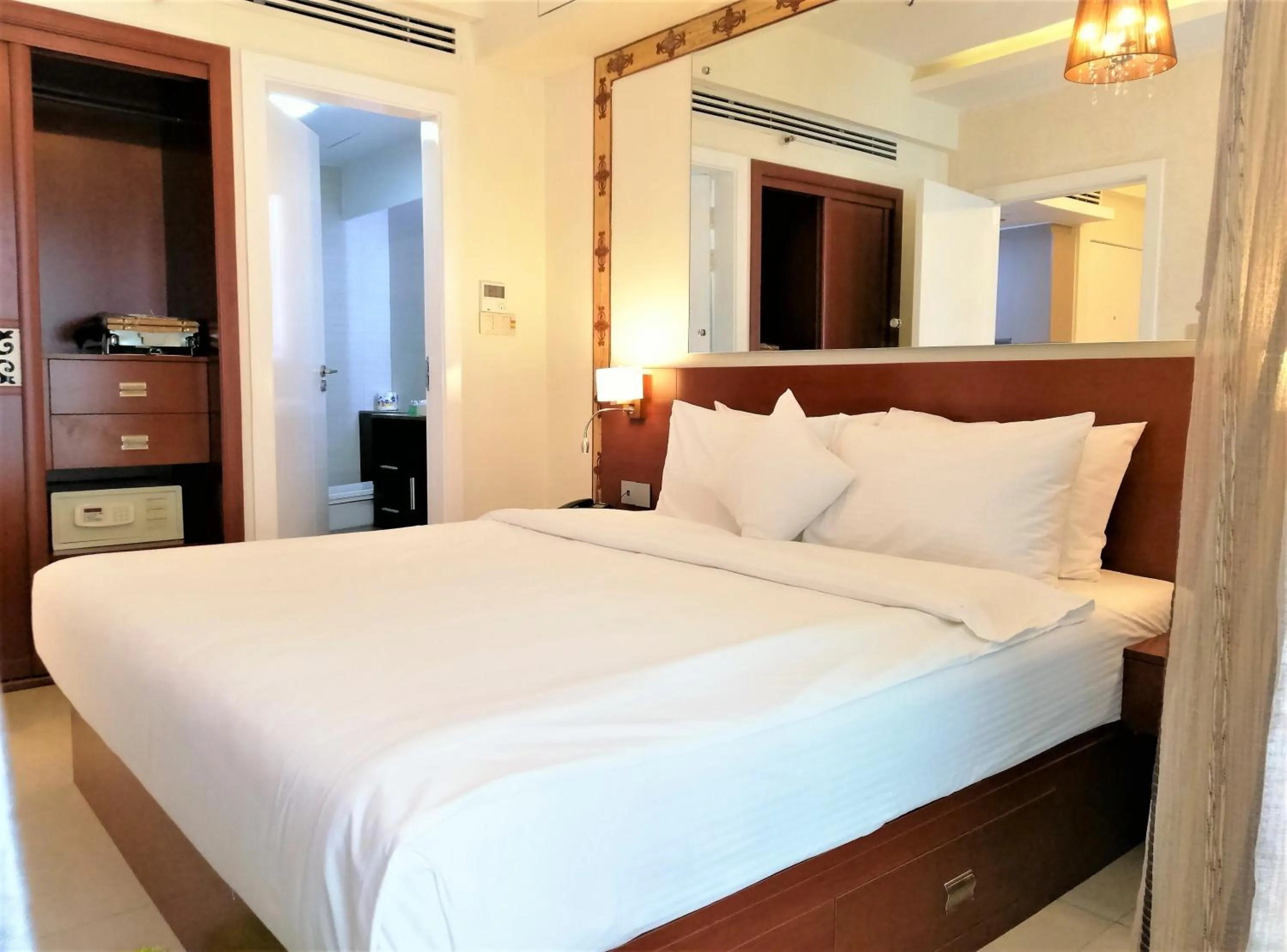 Bed in Coventina Lake Suites