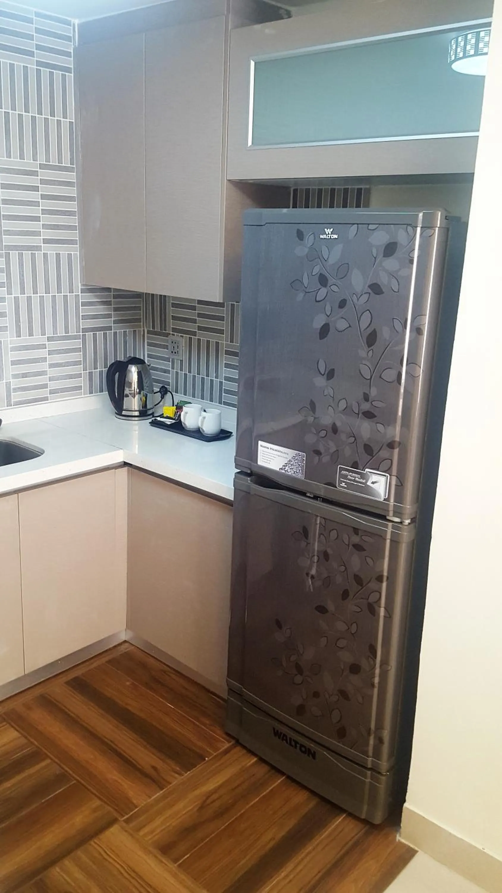 Kitchen or kitchenette in Coventina Lake Suites