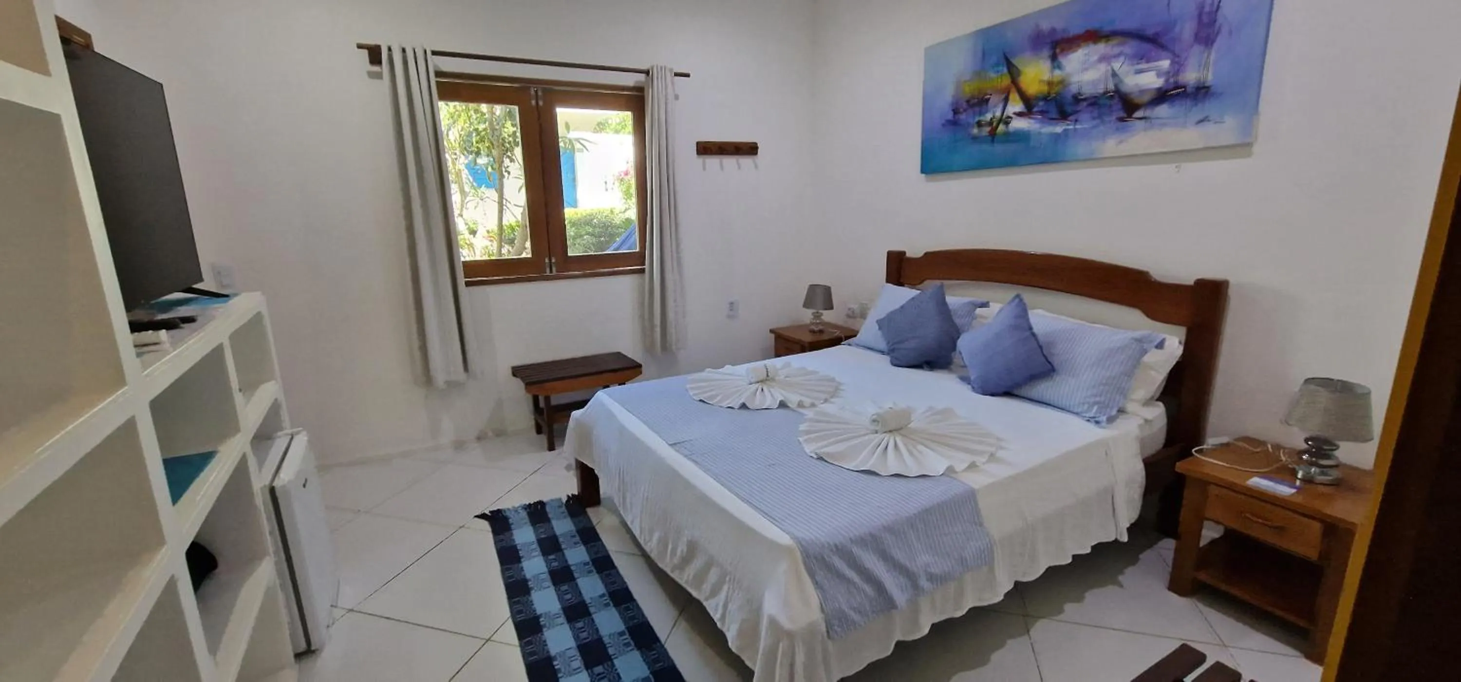 Bed in Pousada Caminho da Praia