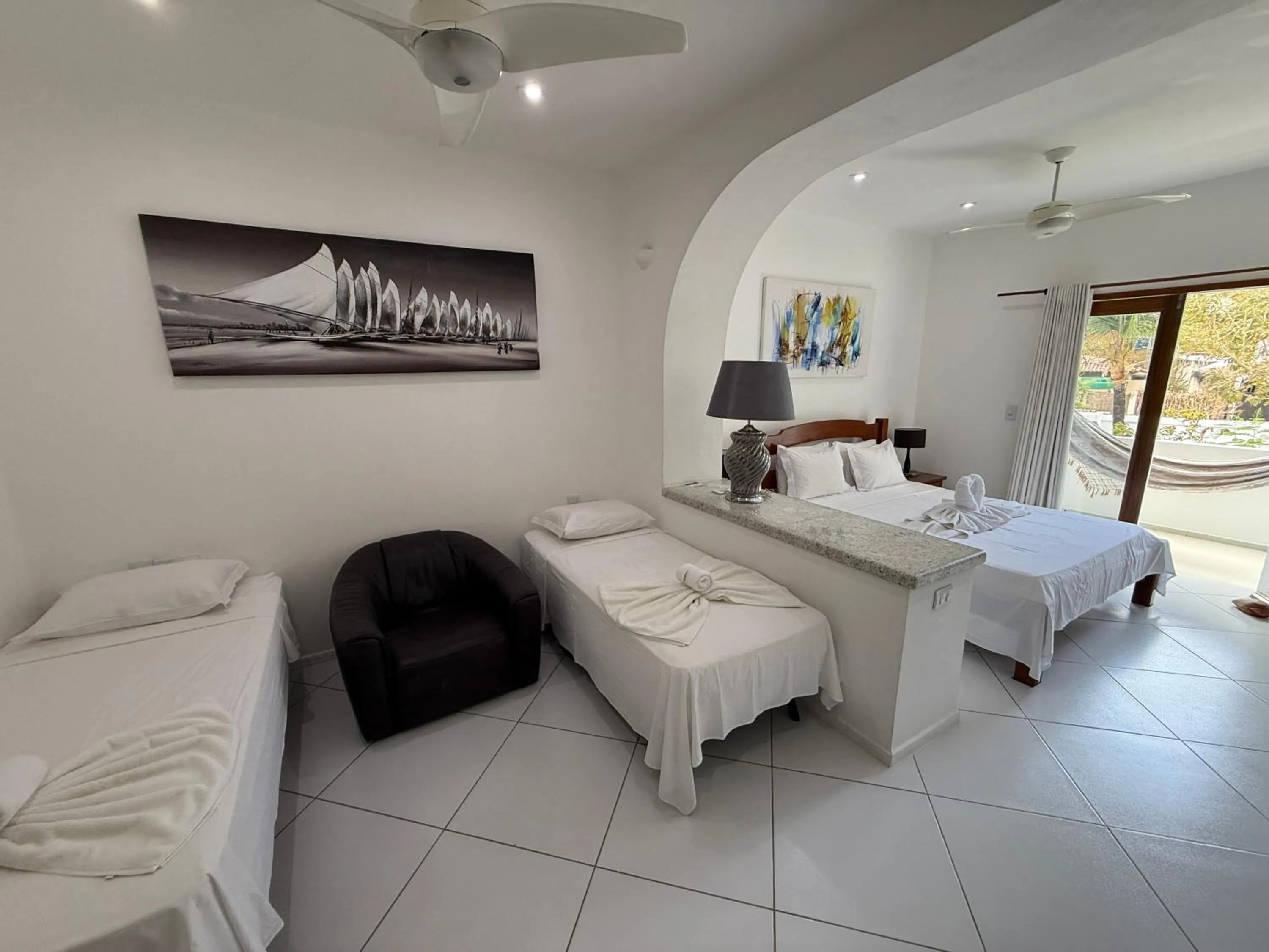 Bed in Pousada Caminho da Praia